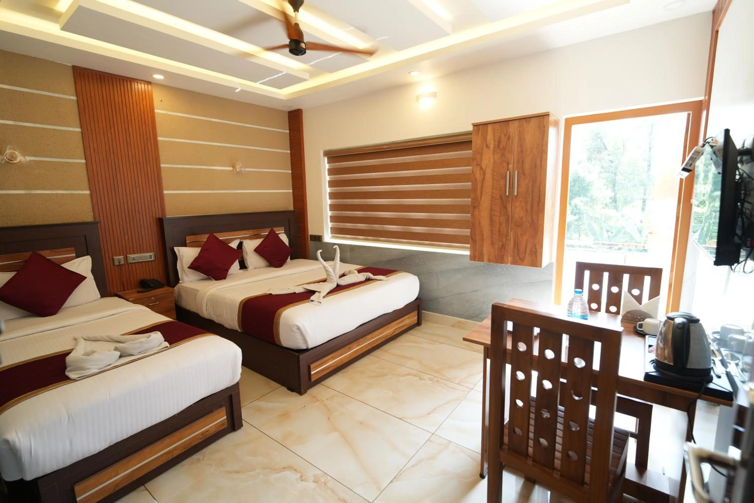 Bed in MARINA SUITES AIRPORT HOTEL