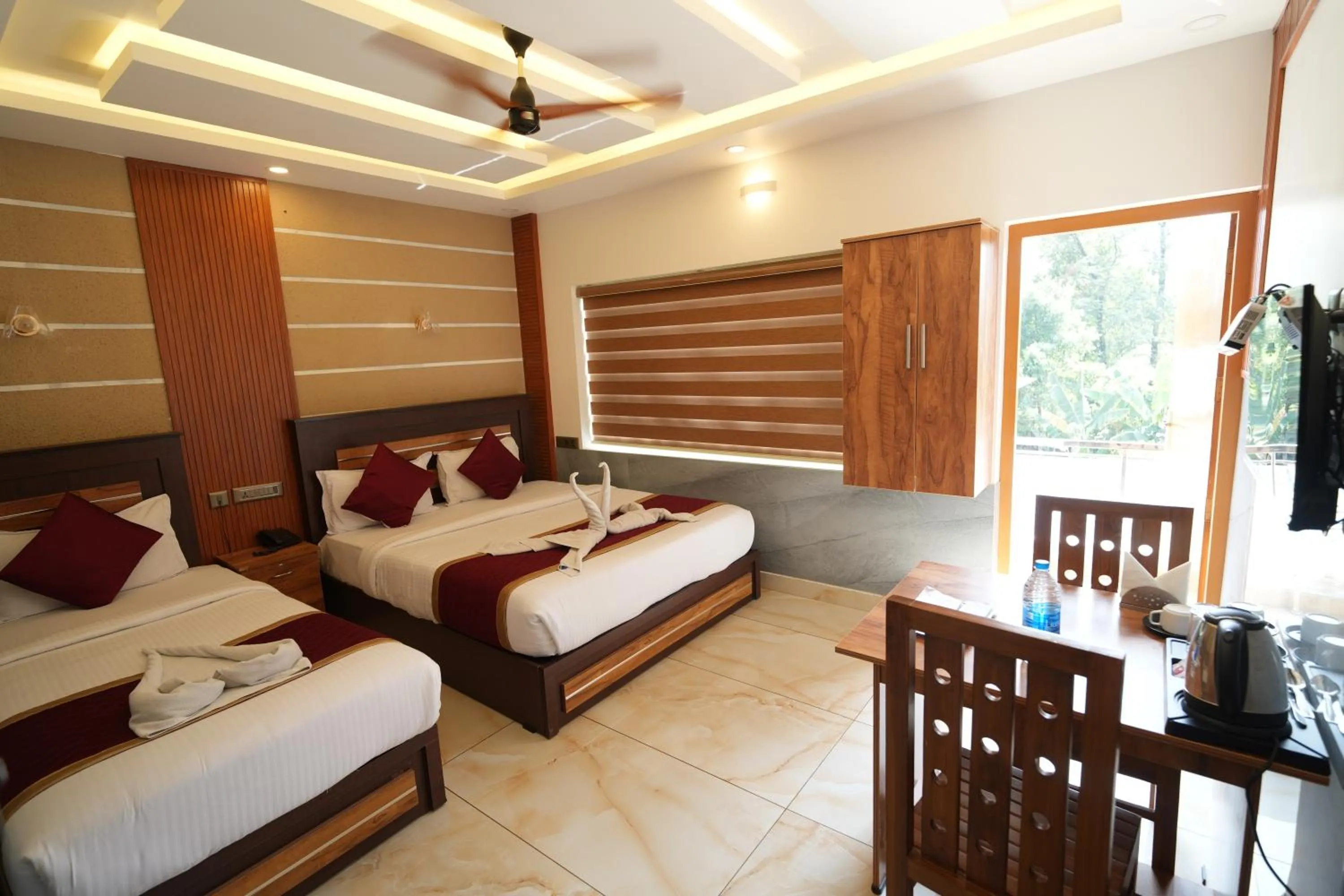 Bed in MARINA SUITES AIRPORT HOTEL