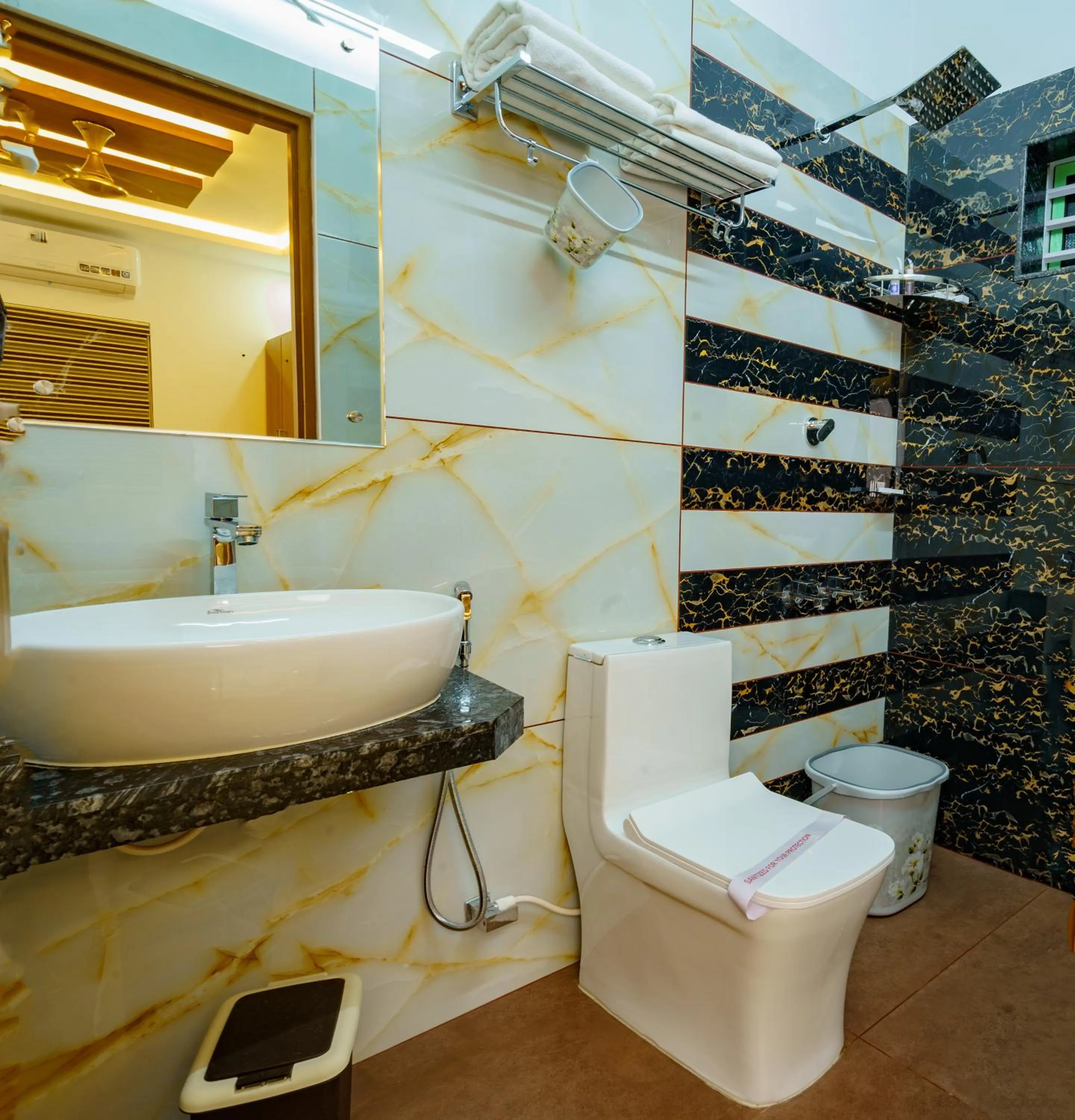 Shower in MARINA SUITES AIRPORT HOTEL