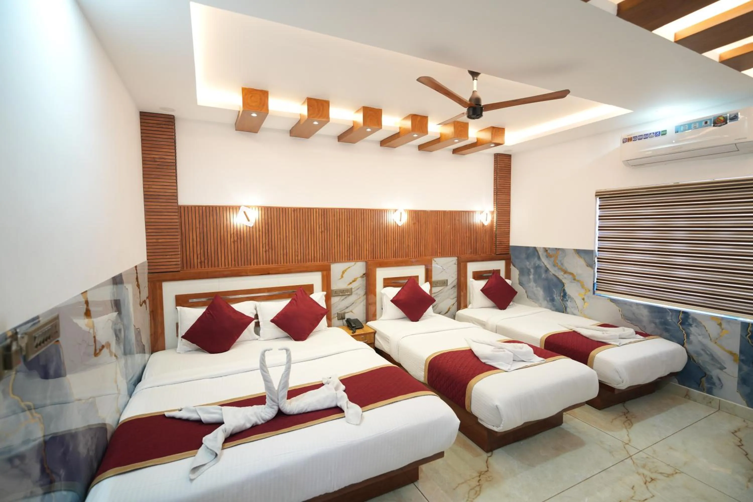 Bed in MARINA SUITES AIRPORT HOTEL