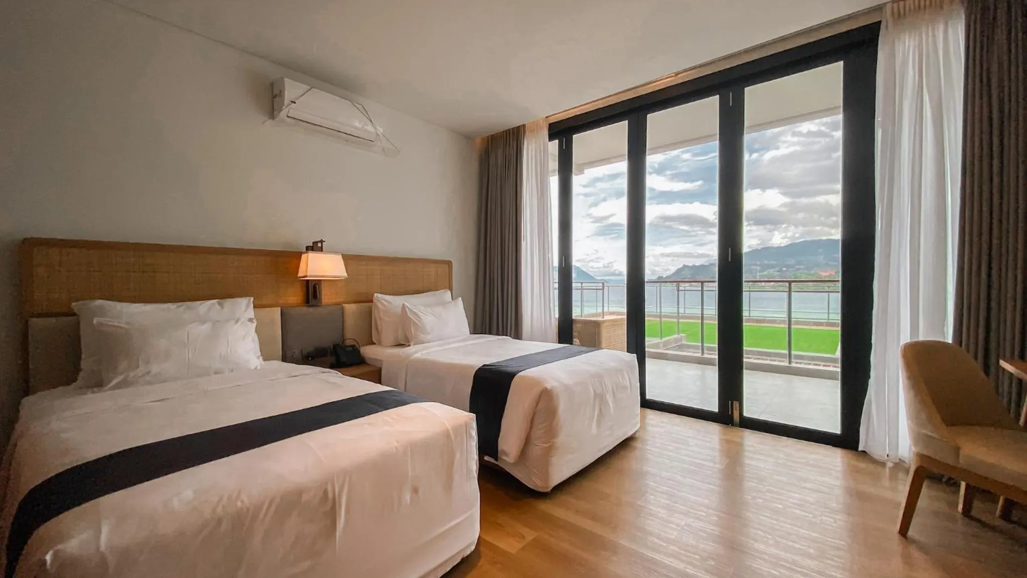 Bedroom, Bed in Marianna Resort And Convention Tuktuk - Samosir, Marclan Collection