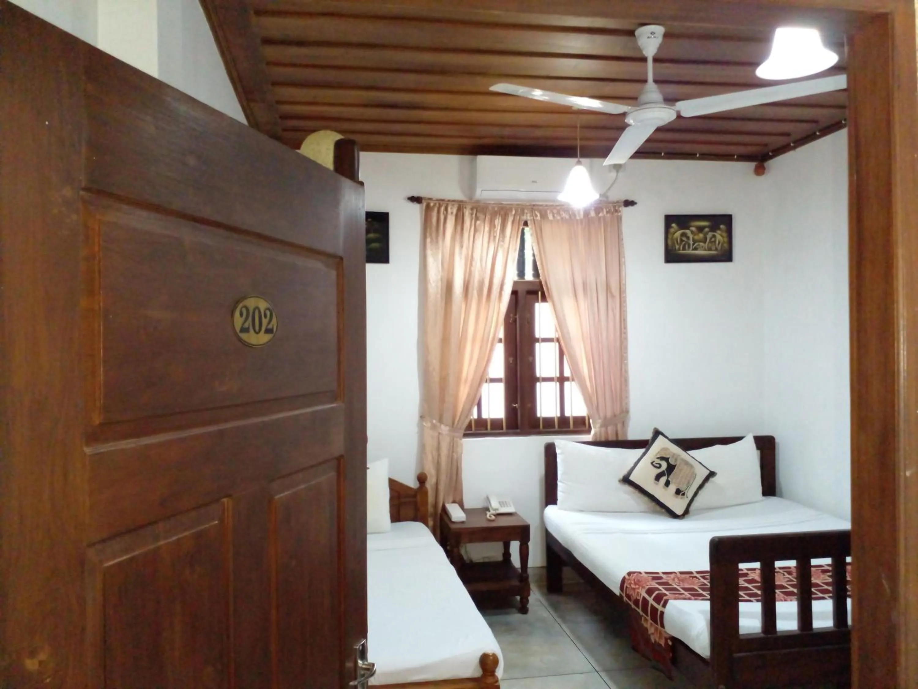 Bed in Muduna Walawwa Resort