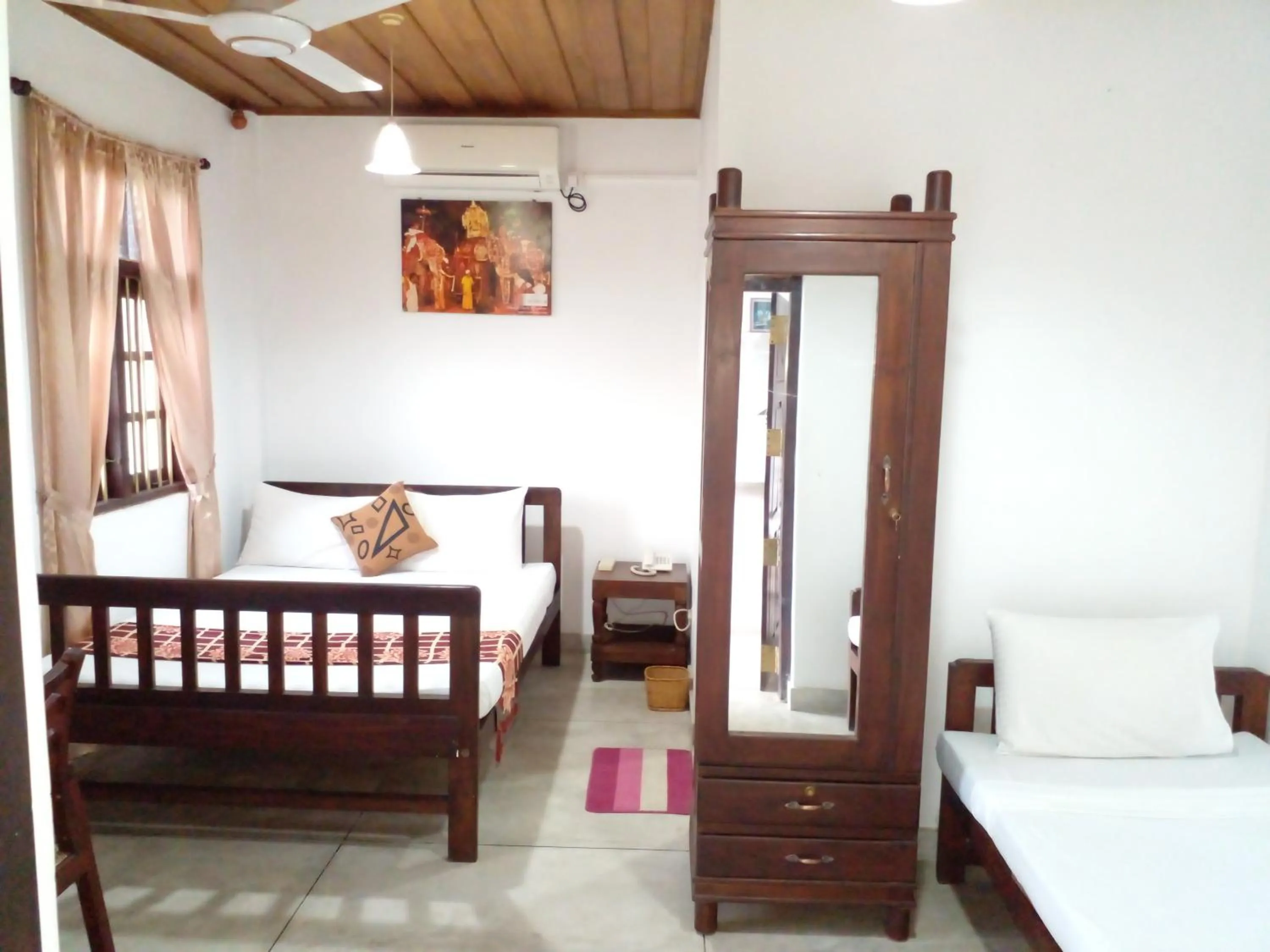 Bed in Muduna Walawwa Resort