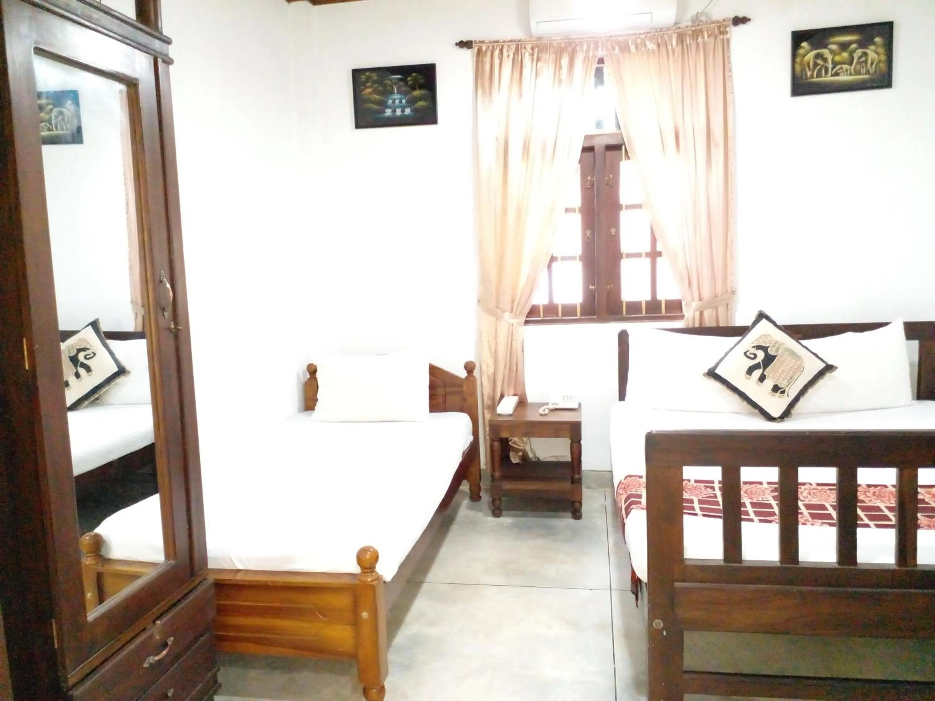 Bed in Muduna Walawwa Resort