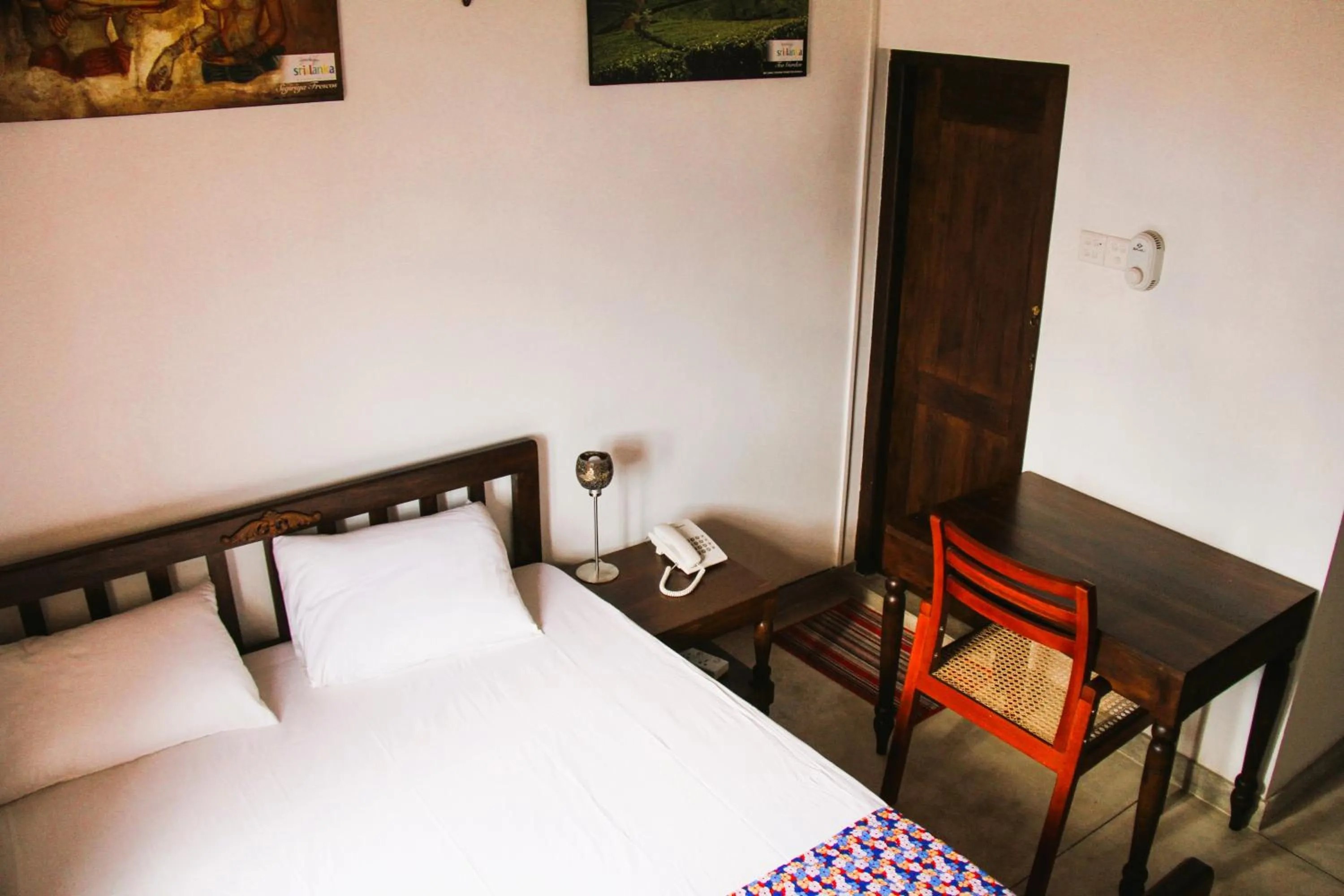 Bed in Muduna Walawwa Resort