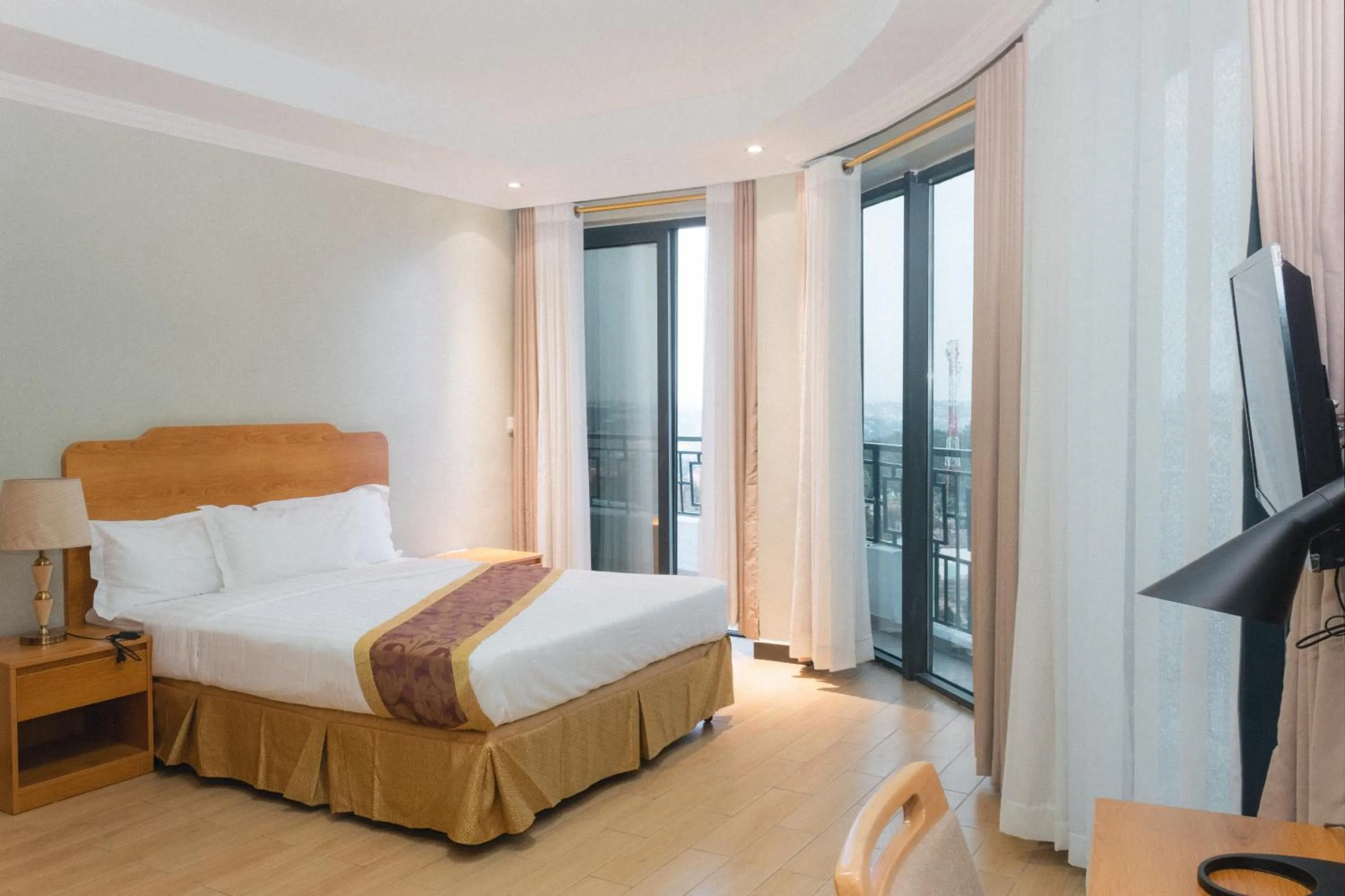 Bedroom in Tropical Plaza Apartments