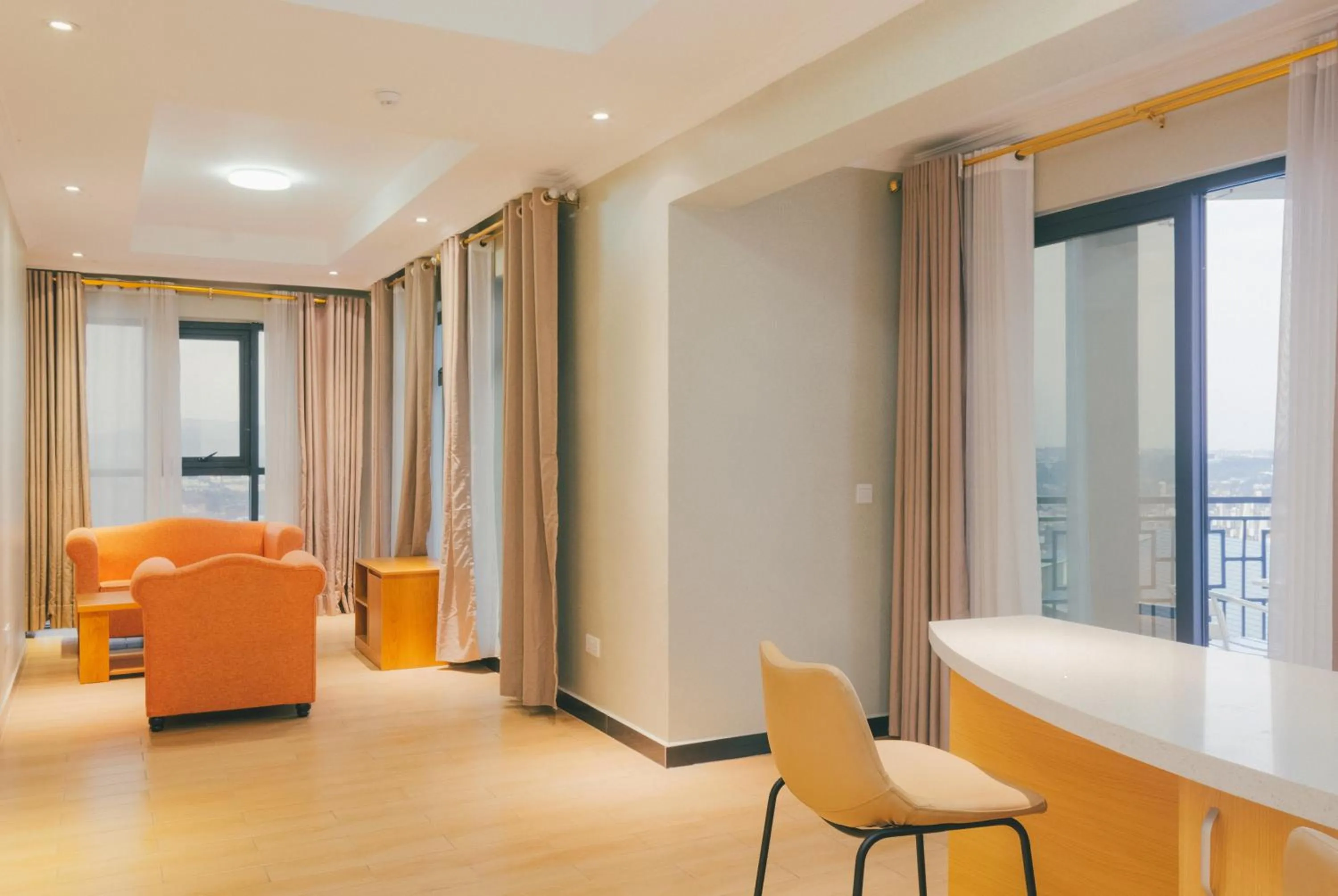 Living room in Tropical Plaza Apartments