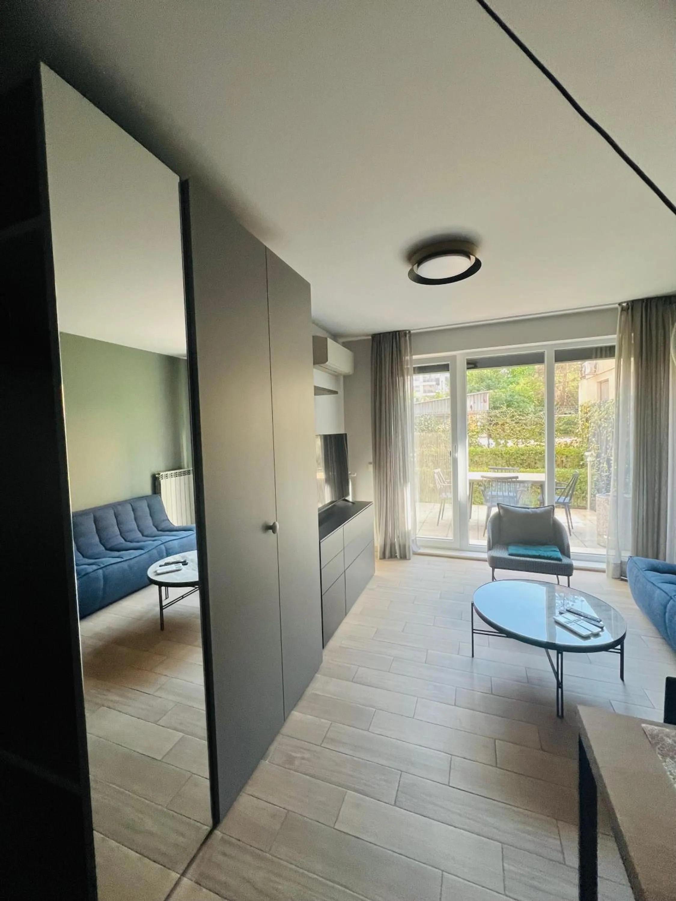 Living room, Bed in 7th Sense boutique apartments