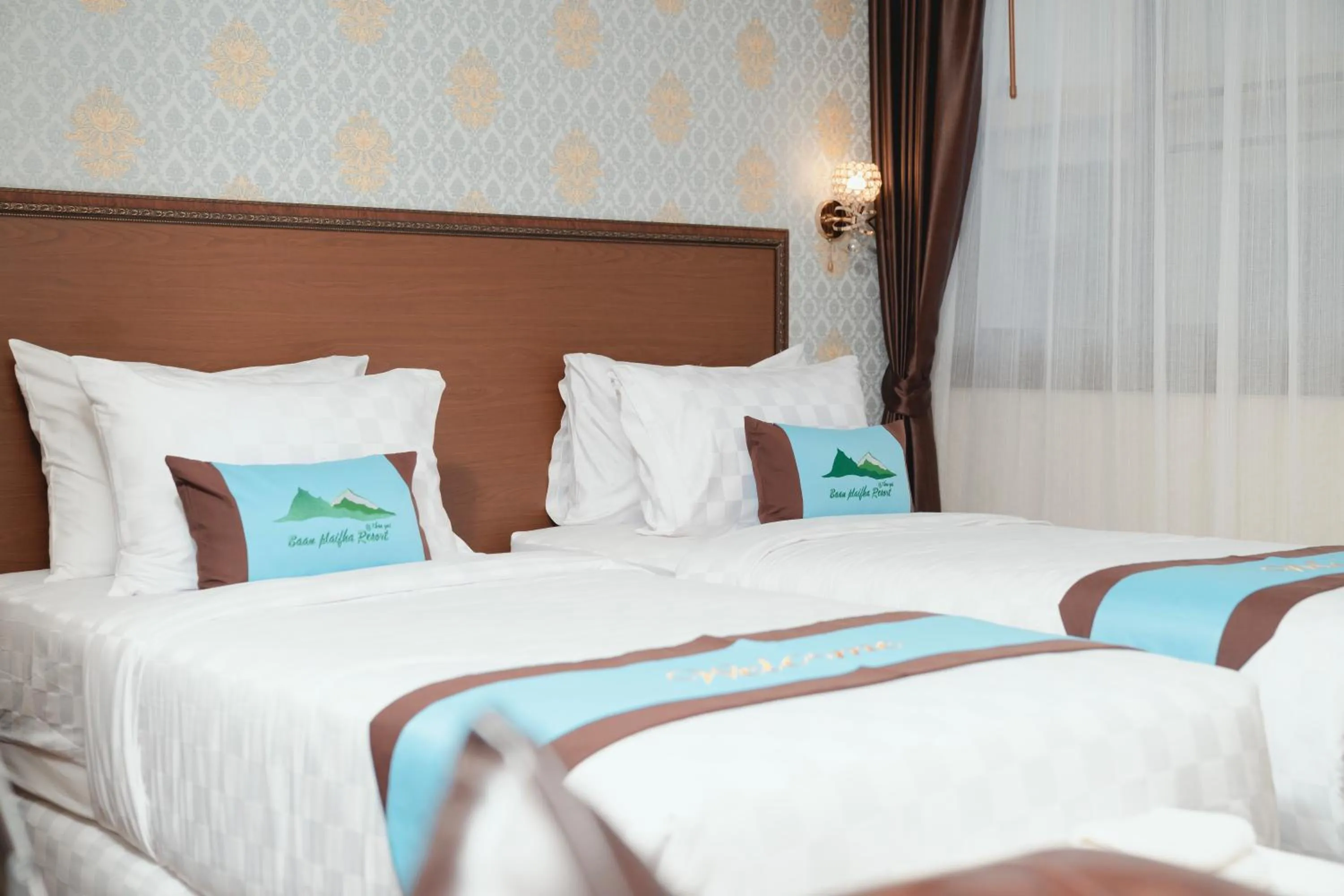 Bed in Baan Plaifah Khao Yai Hotel