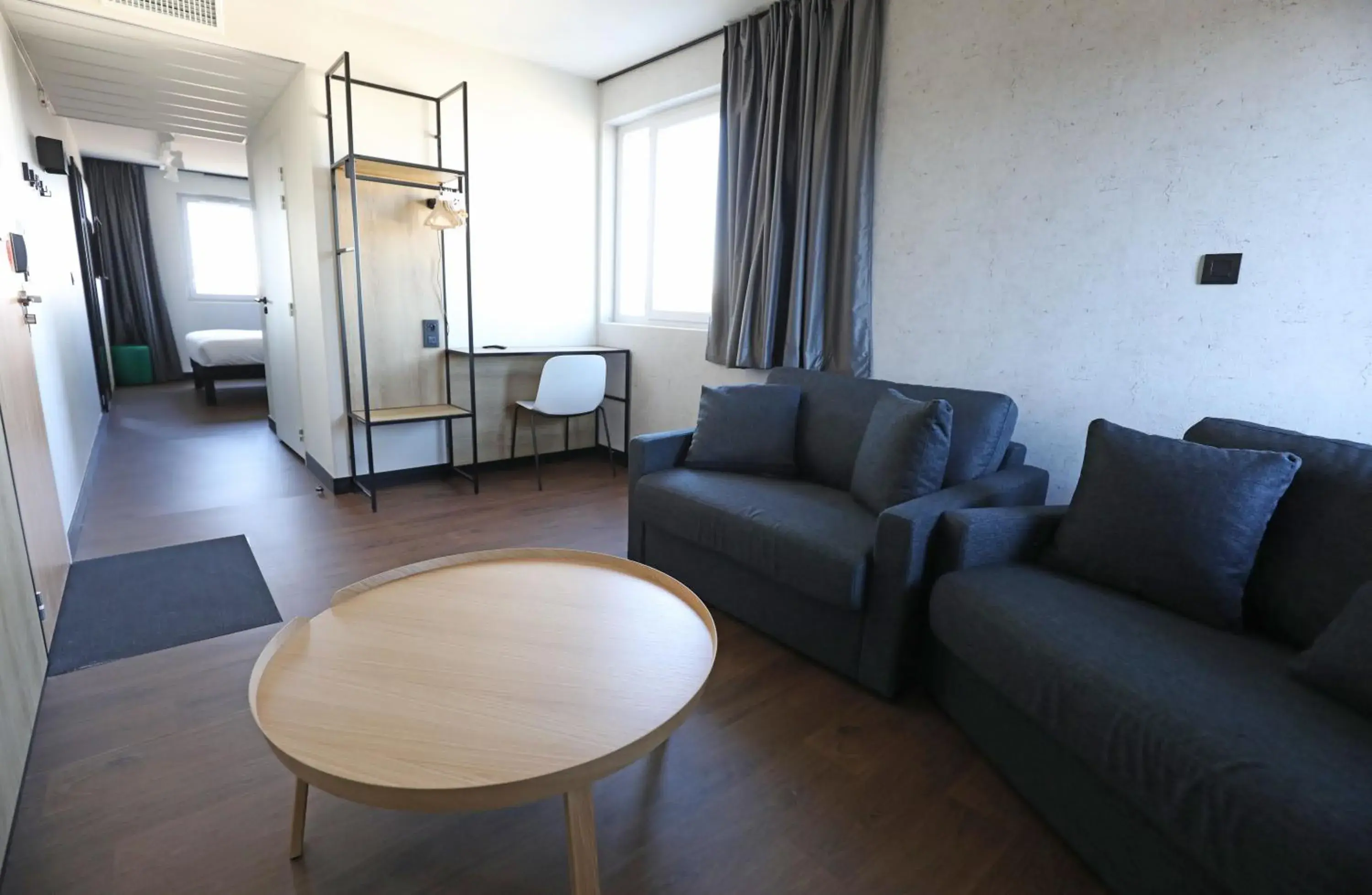 Family Room with One Double Bed and Two Sofa Beds in Ibis Bourgoin Jallieu Medipole Family Room with One Double Bed and Two Sofa Beds in Ibis Bourgoin Jallieu Medipole