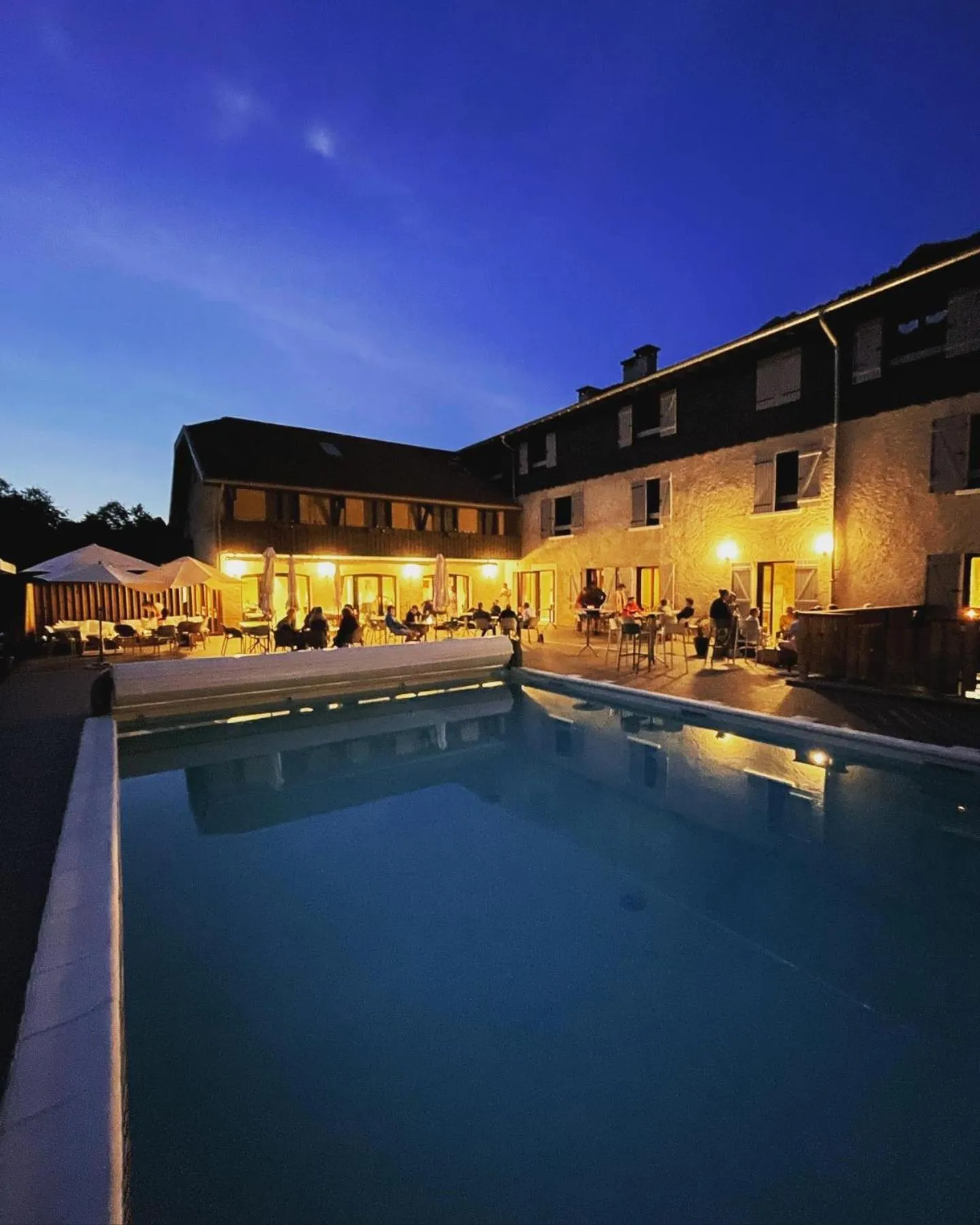 Swimming pool in Hôtel Restaurant Le Madame