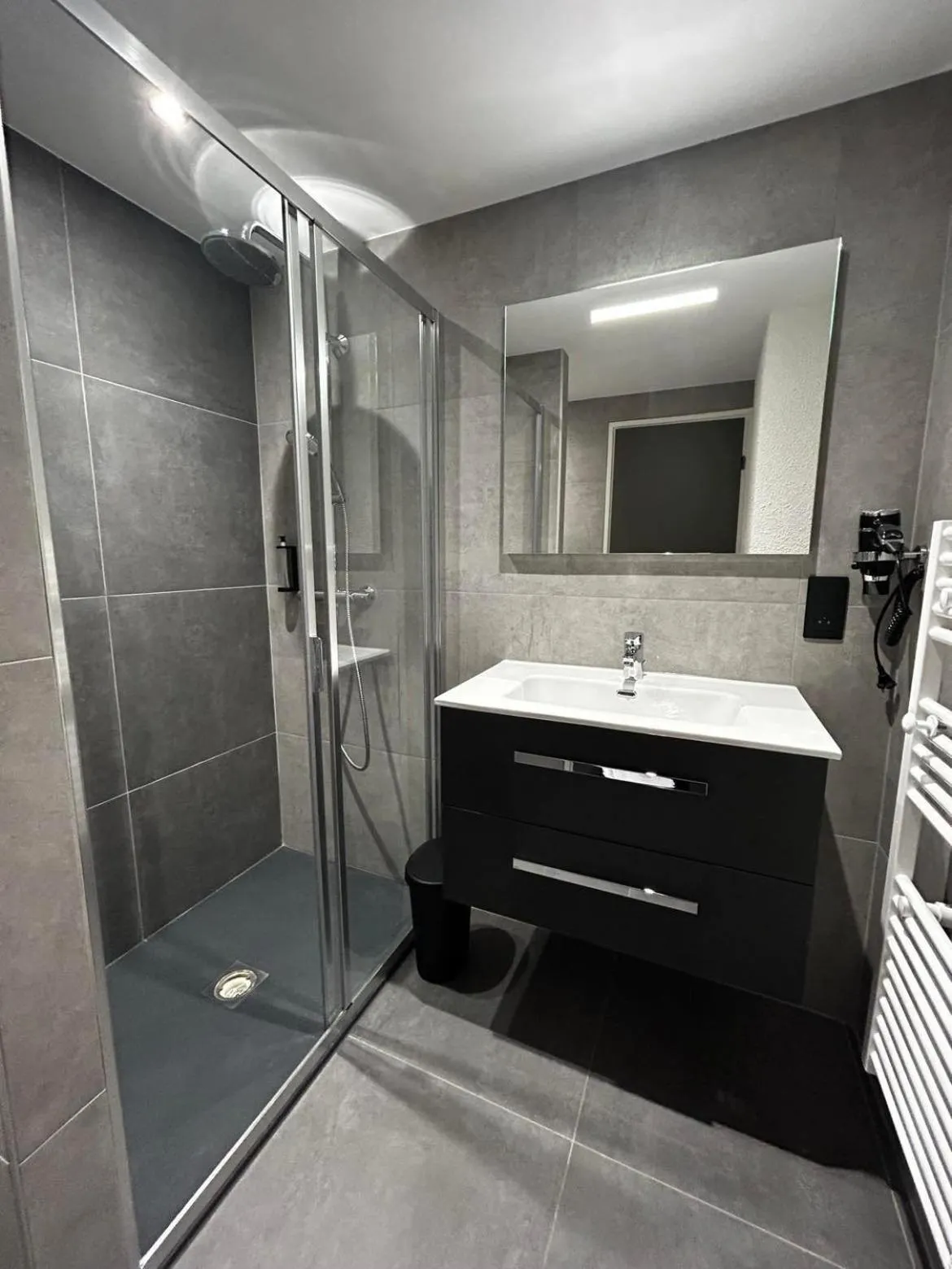 Bathroom in Hôtel Restaurant Le Madame