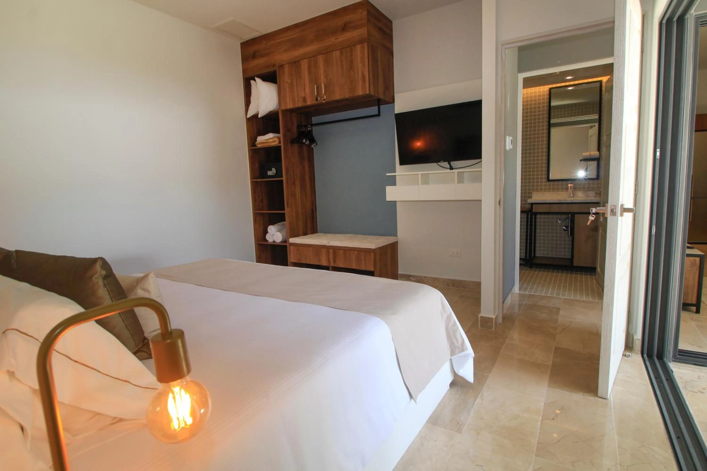 Bed in Singular Dream Vacation Rentals