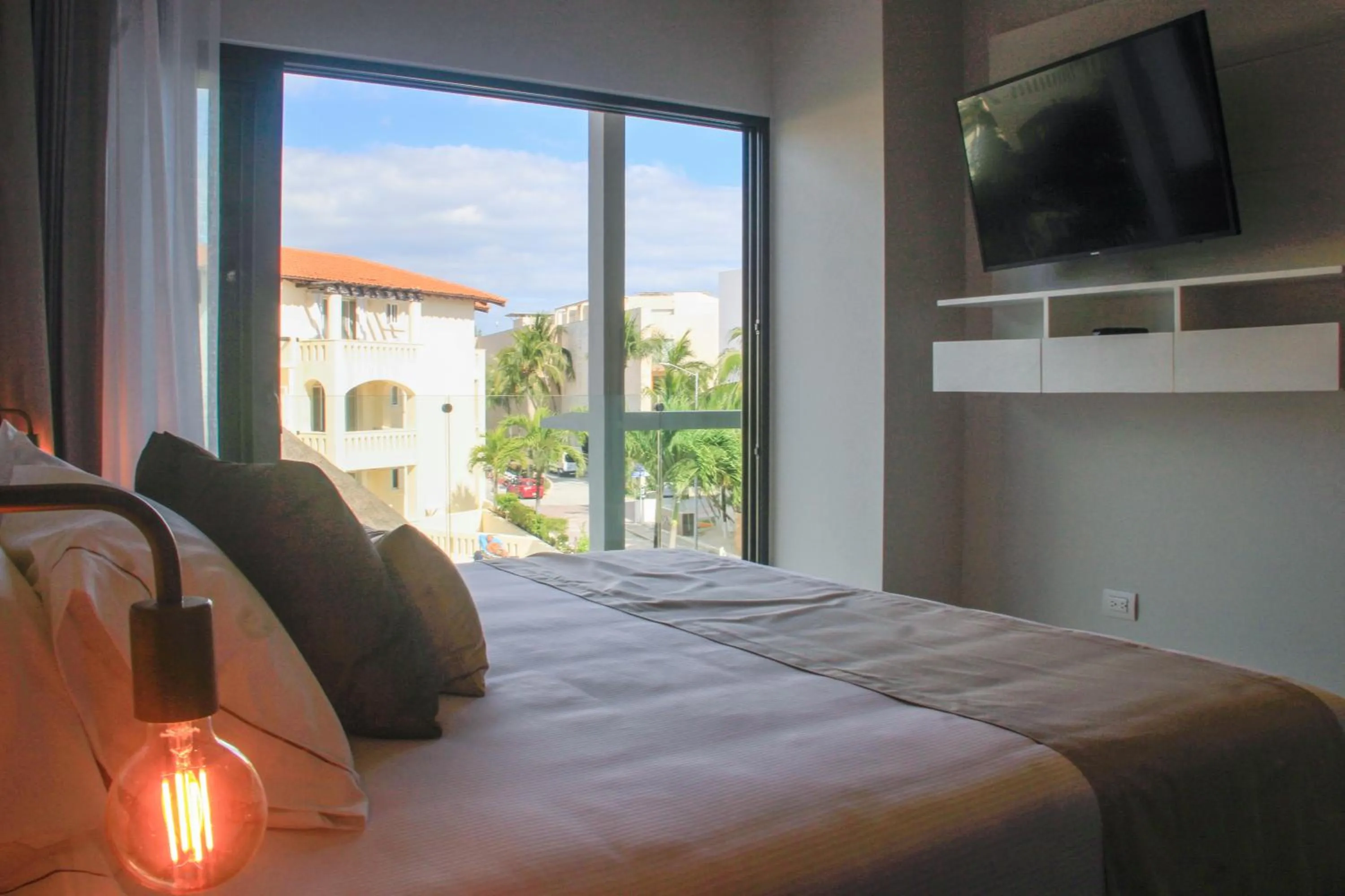 Bed in Singular Dream Vacation Rentals