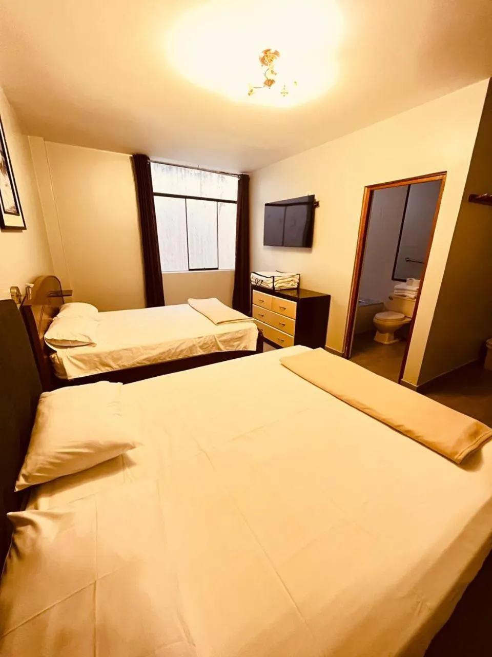 Bed in Hotel Baños del Inca