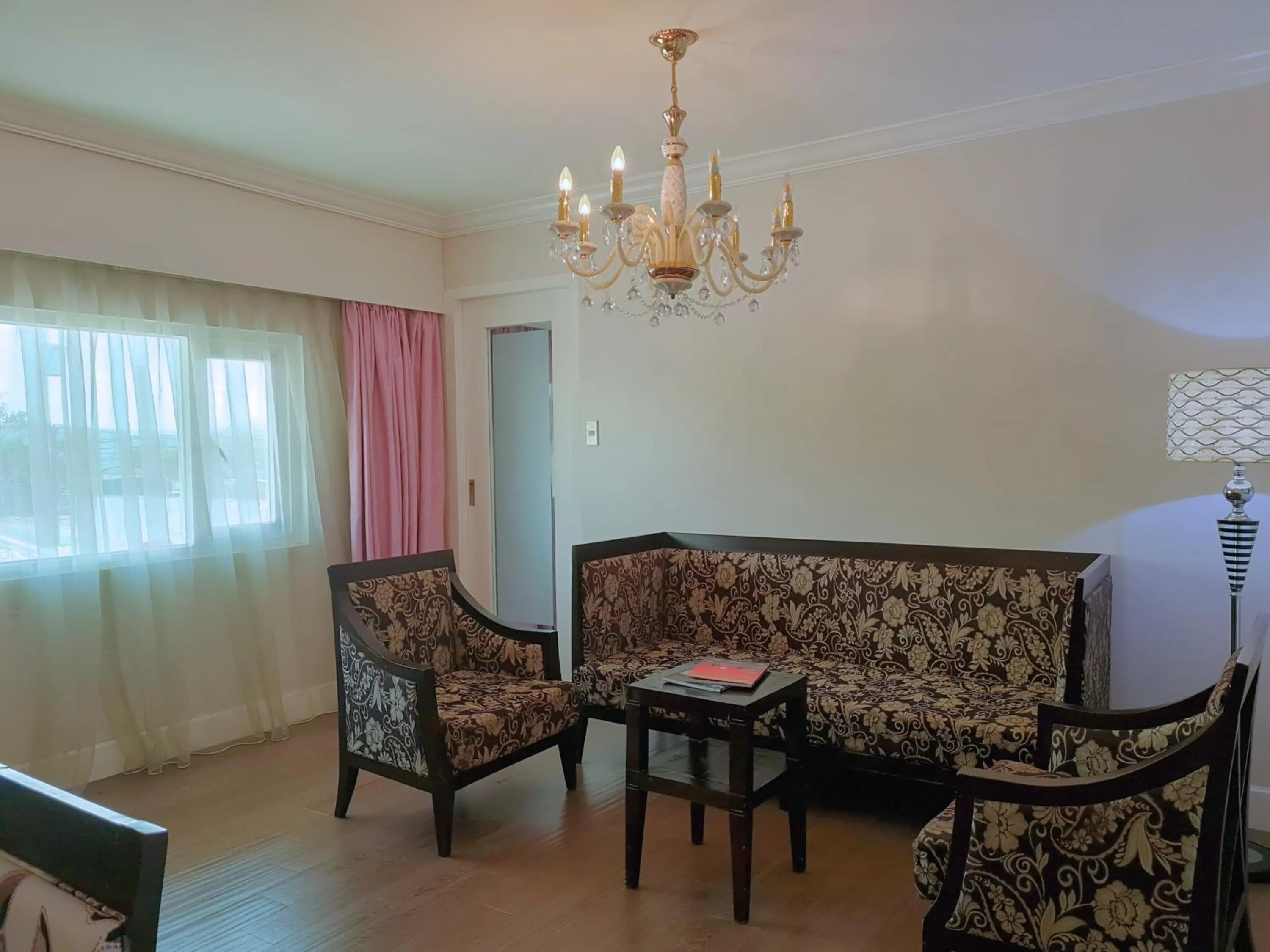 Living room in Fiesta Garden Hotel