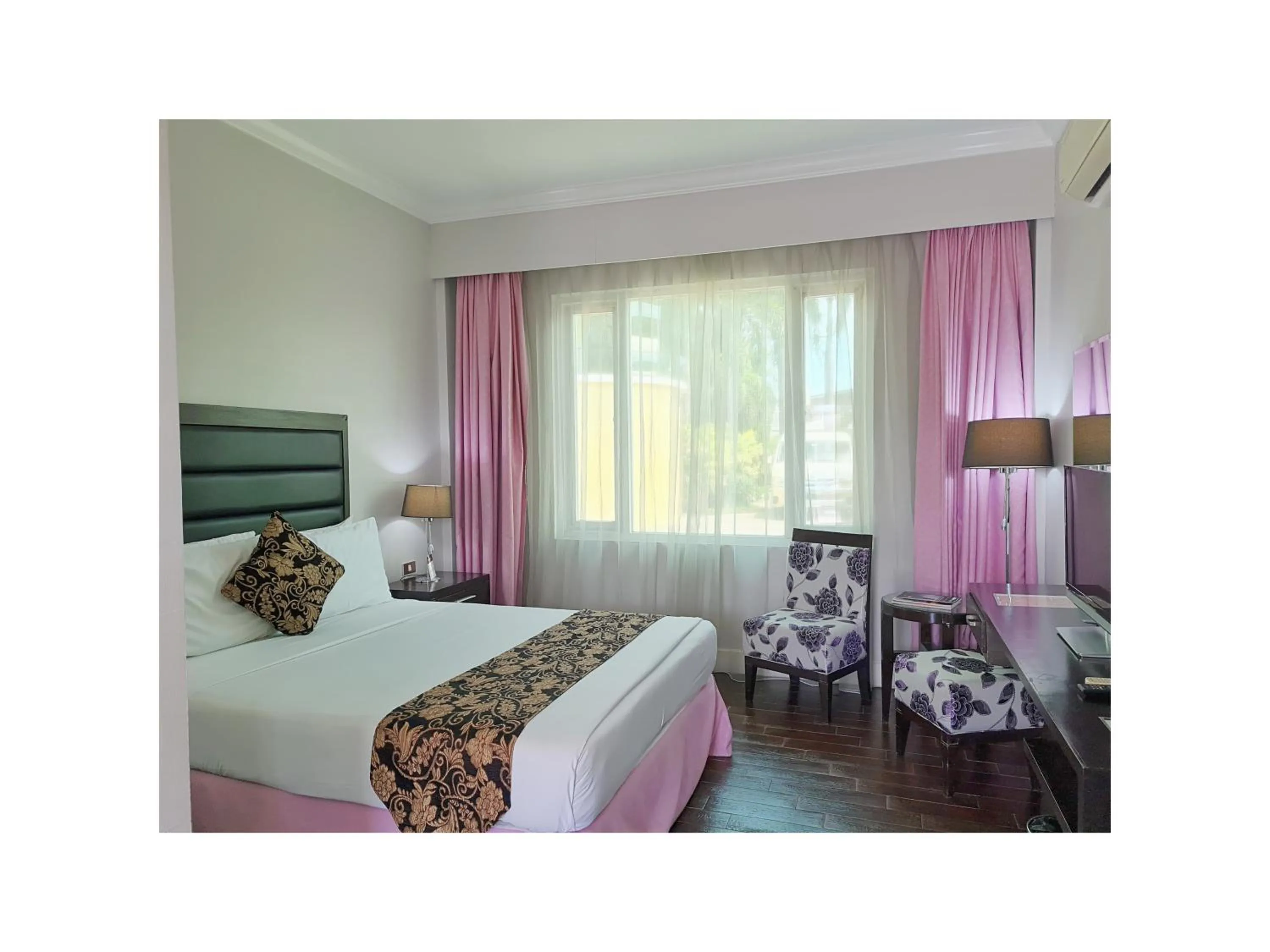 Bed in Fiesta Garden Hotel