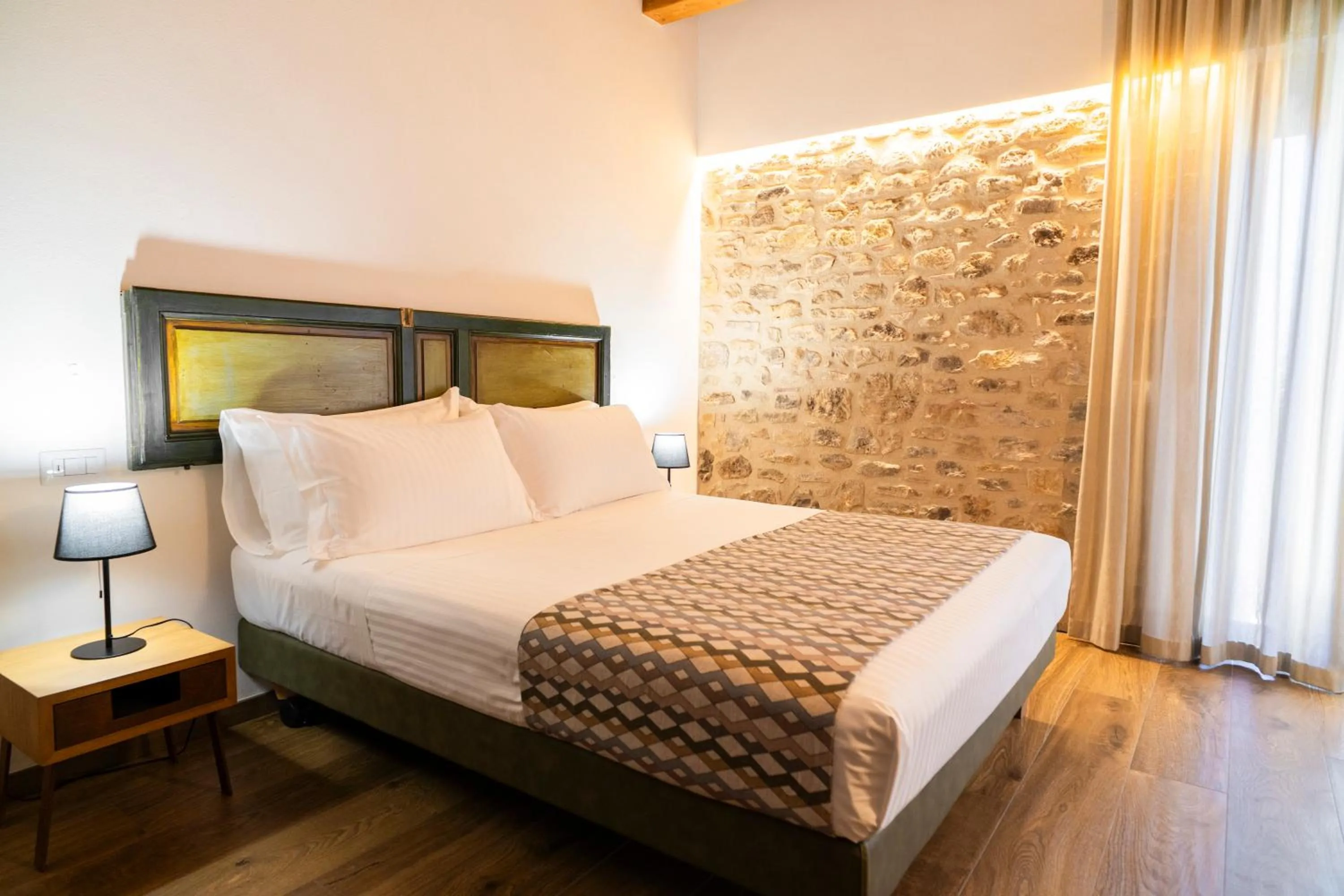 Bed in BAGLIO TRAMONTANA