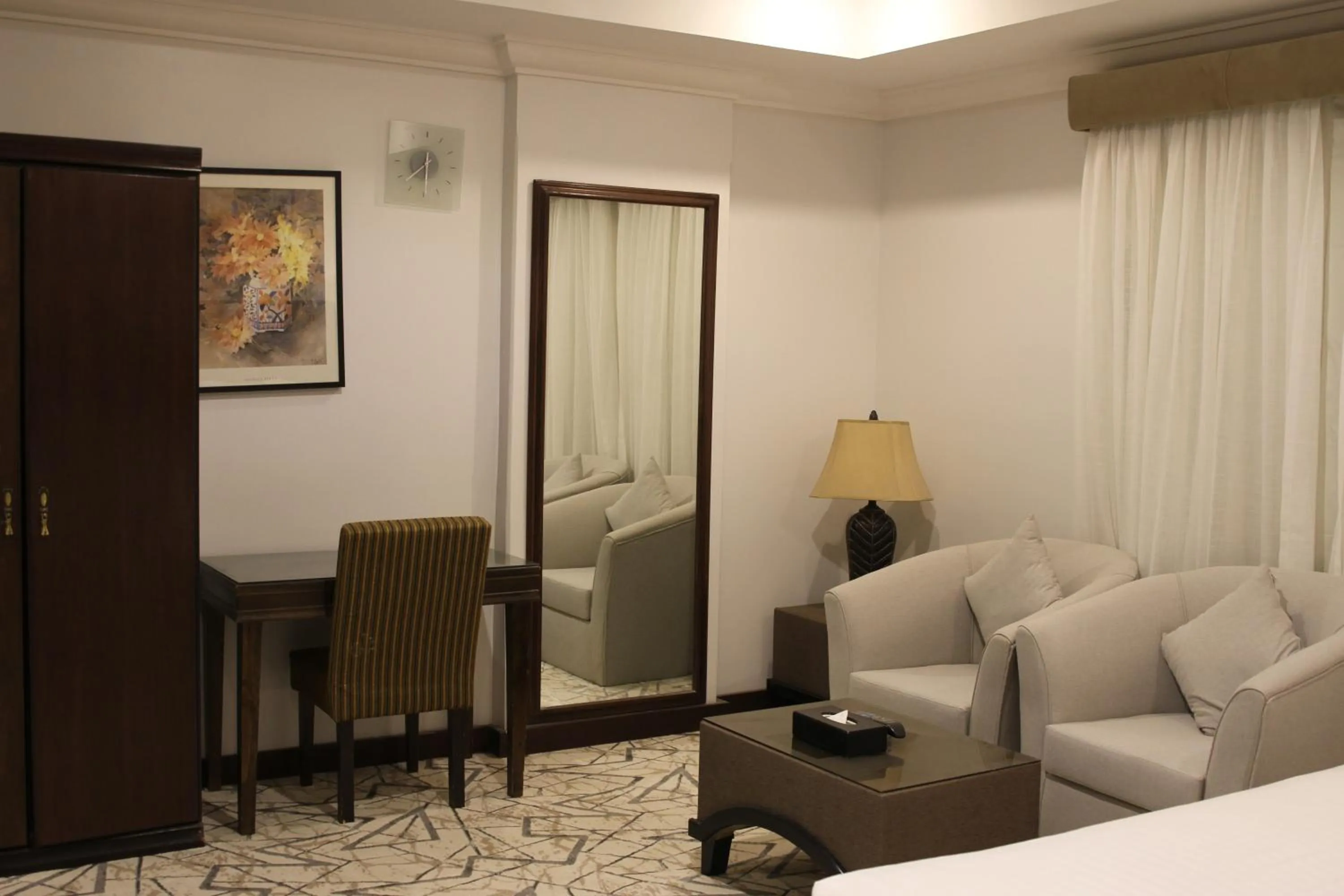 Seating area in Carawan Al Khaleej Hotel Olaya