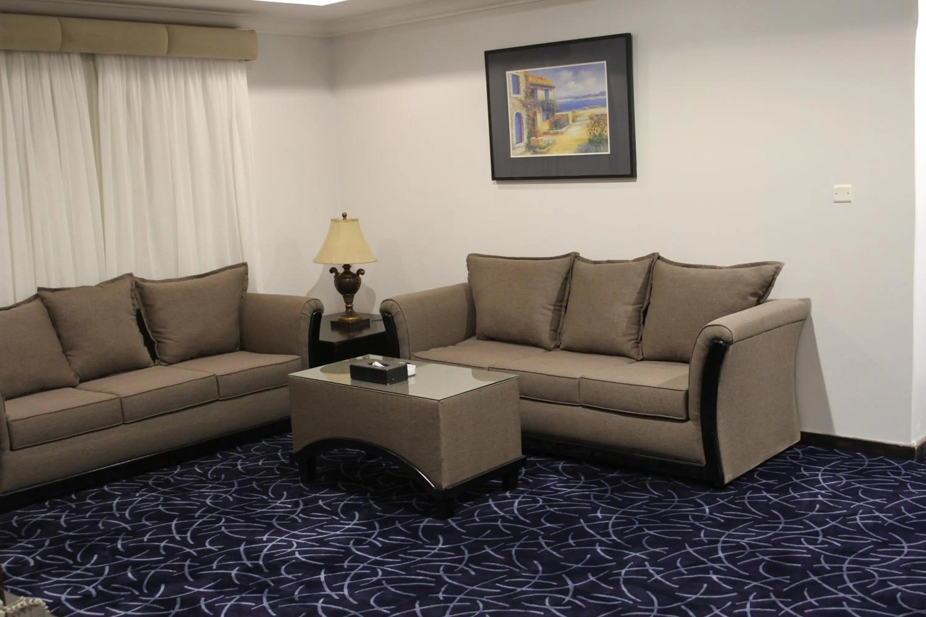 Seating area in Carawan Al Khaleej Hotel Olaya