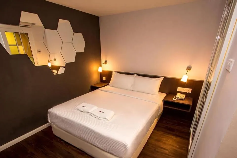 Bed in Sakura Boutique Hotel