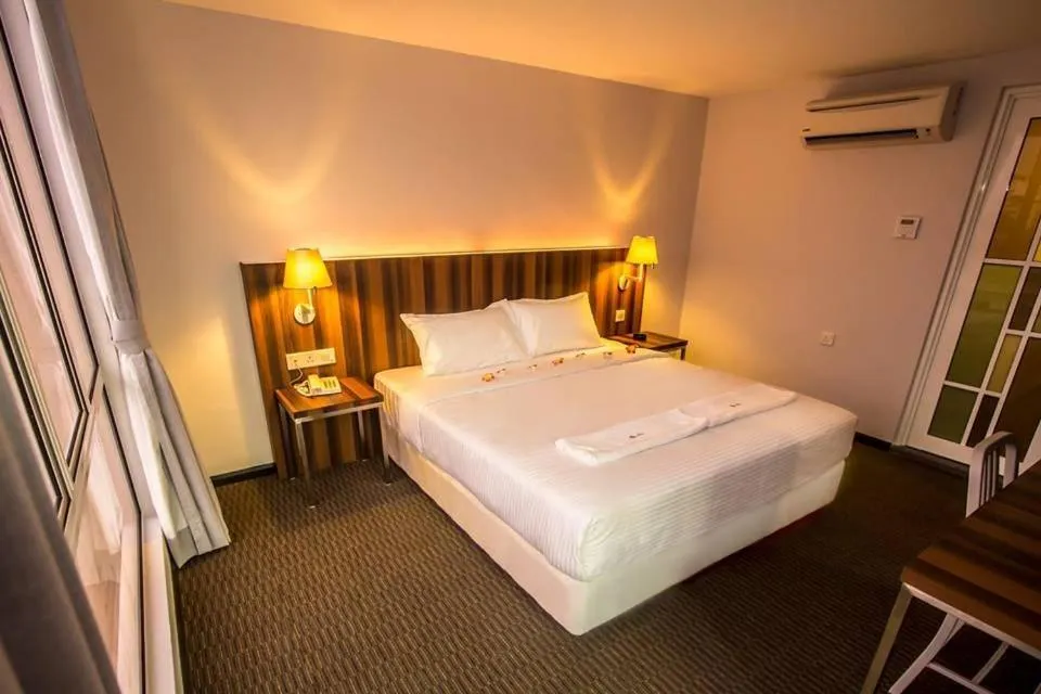 Bed in Sakura Boutique Hotel