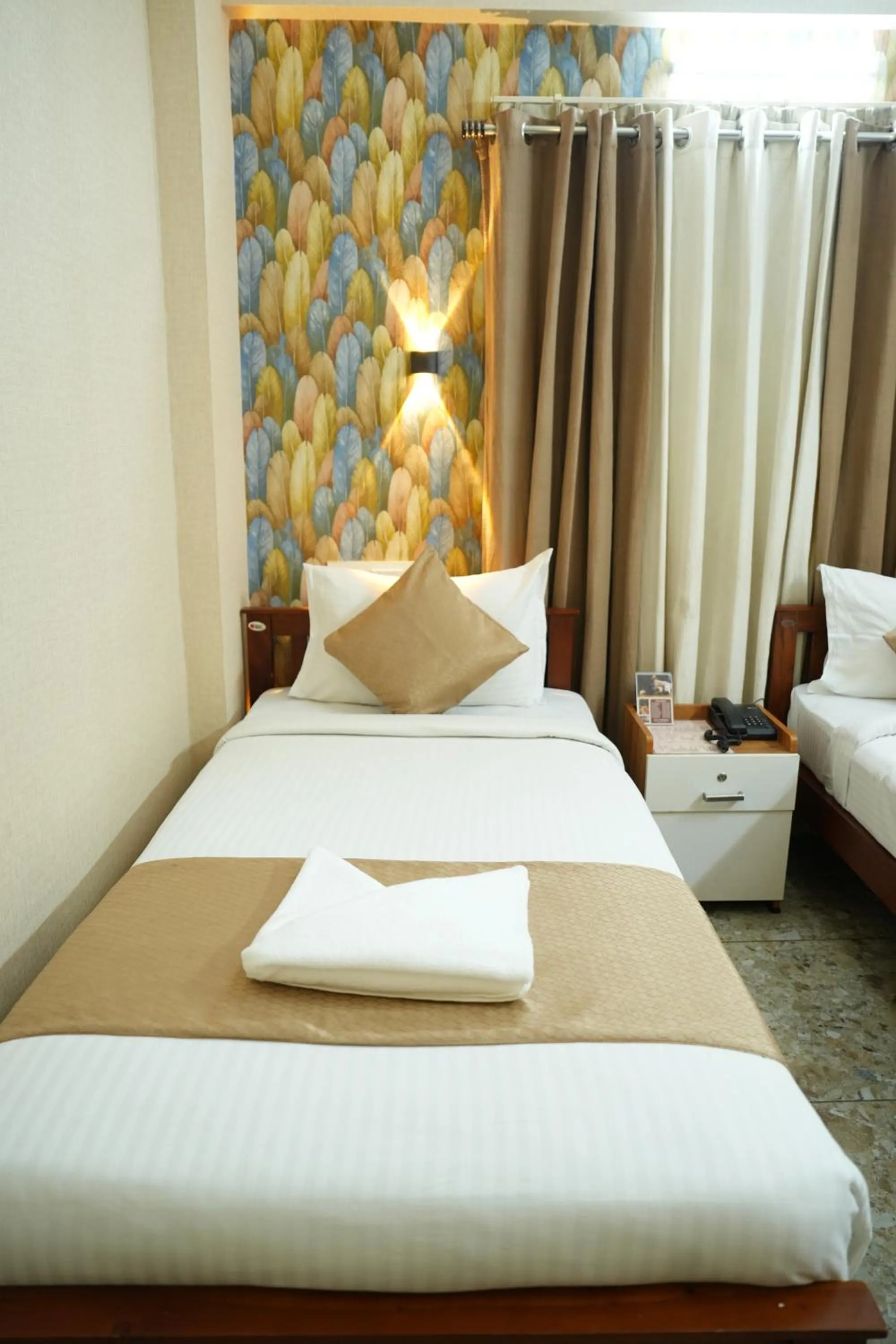 Bed in Dreams Paradise Airport Residency