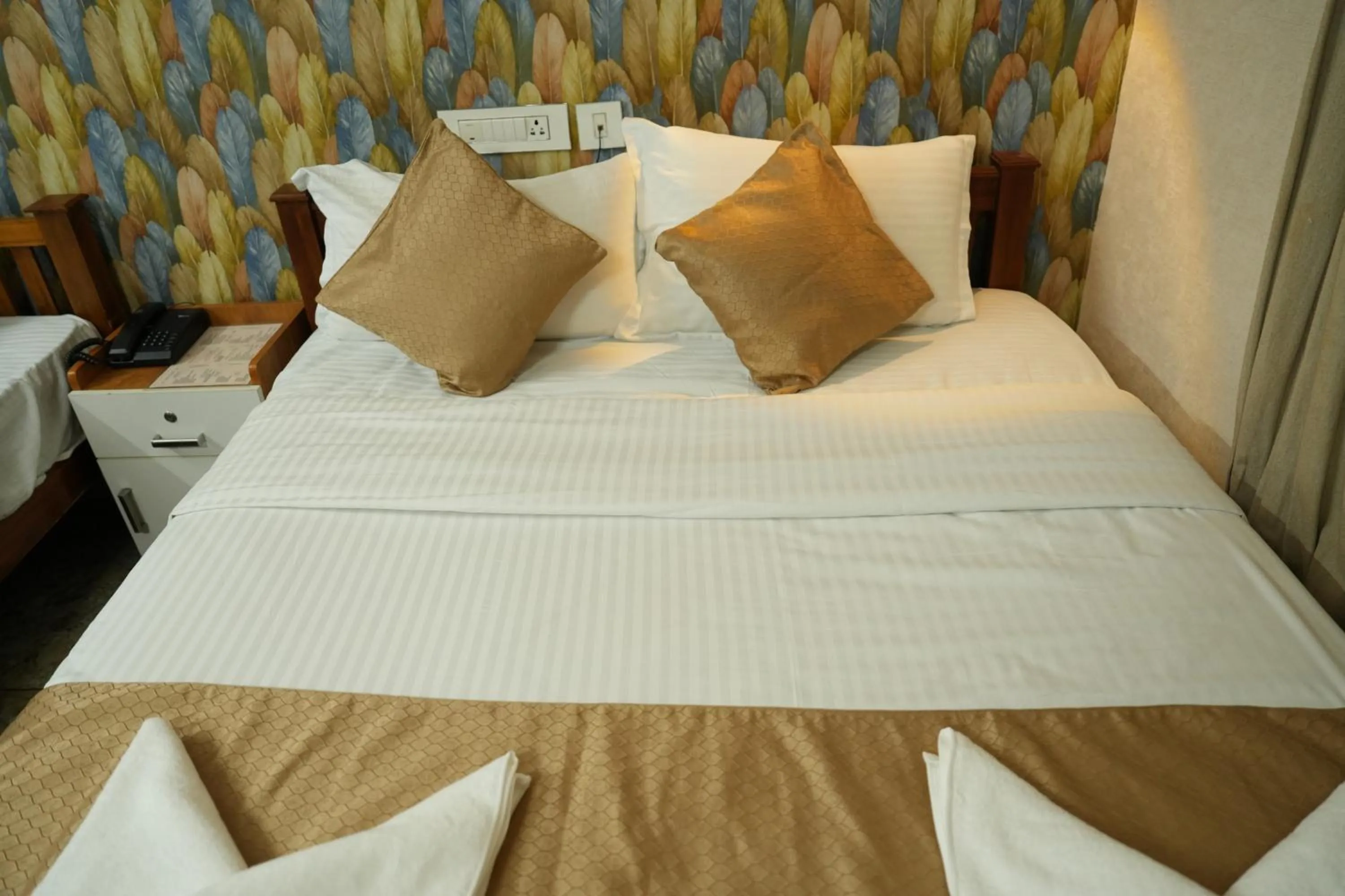 Bed in Dreams Paradise Airport Residency