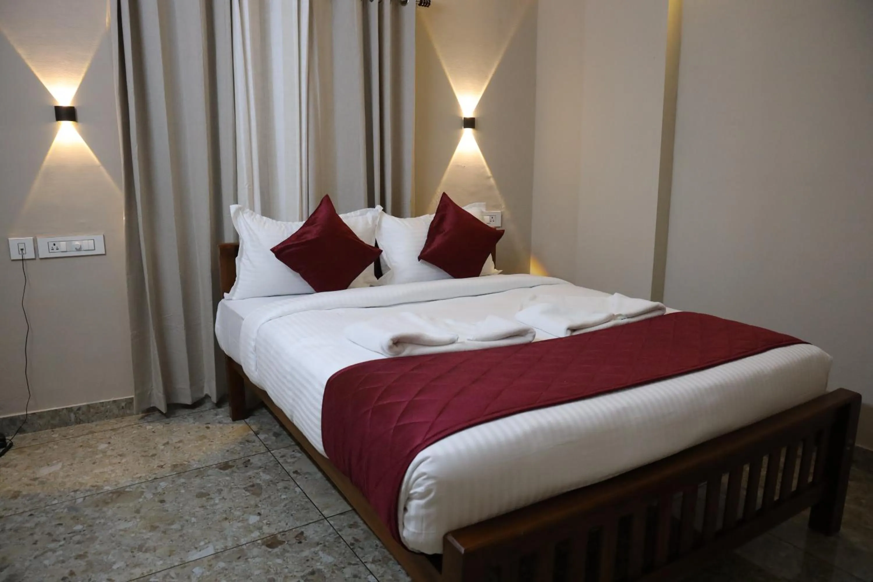 Bed in Dreams Paradise Airport Residency