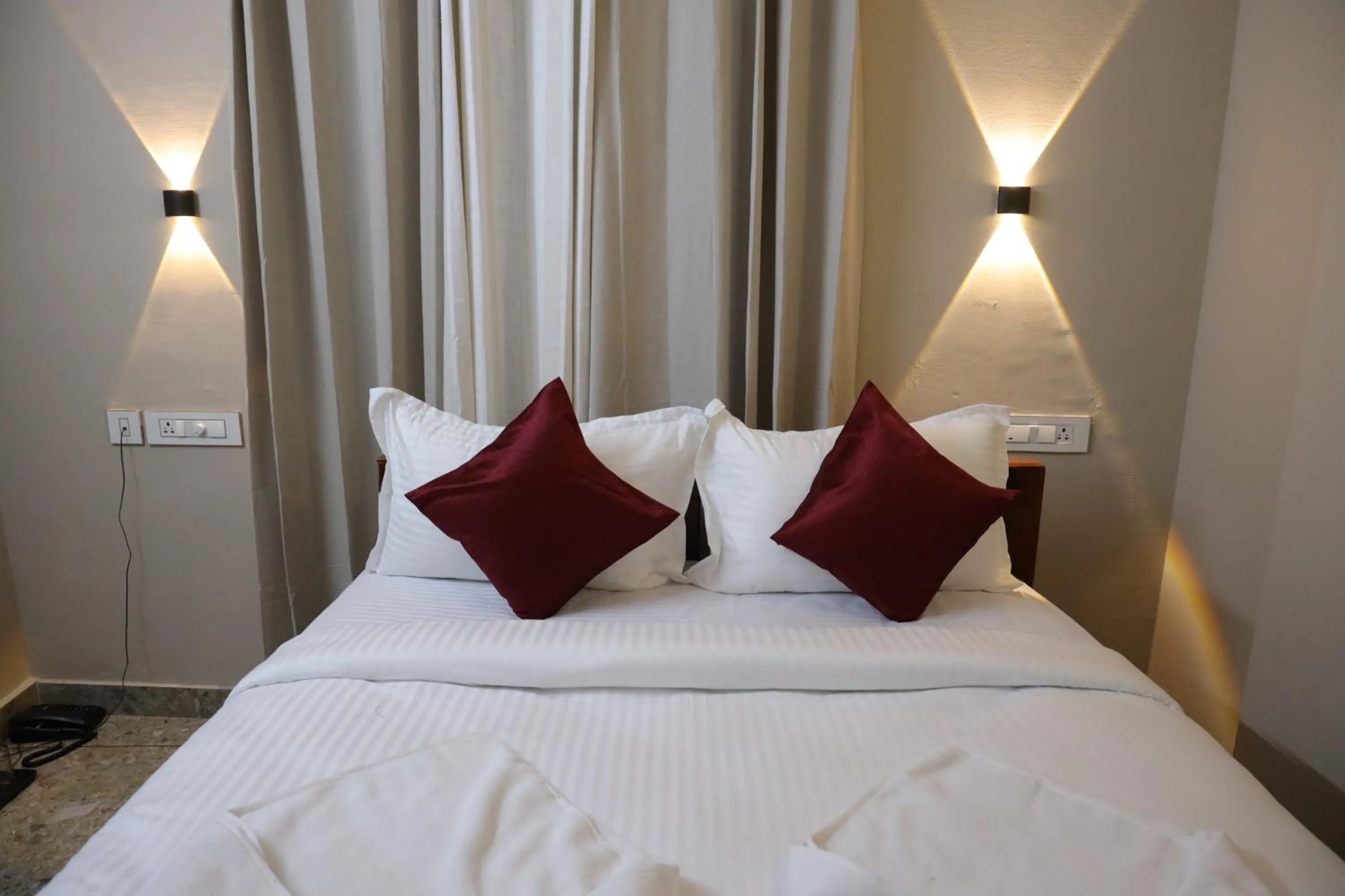 Bed in Dreams Paradise Airport Residency