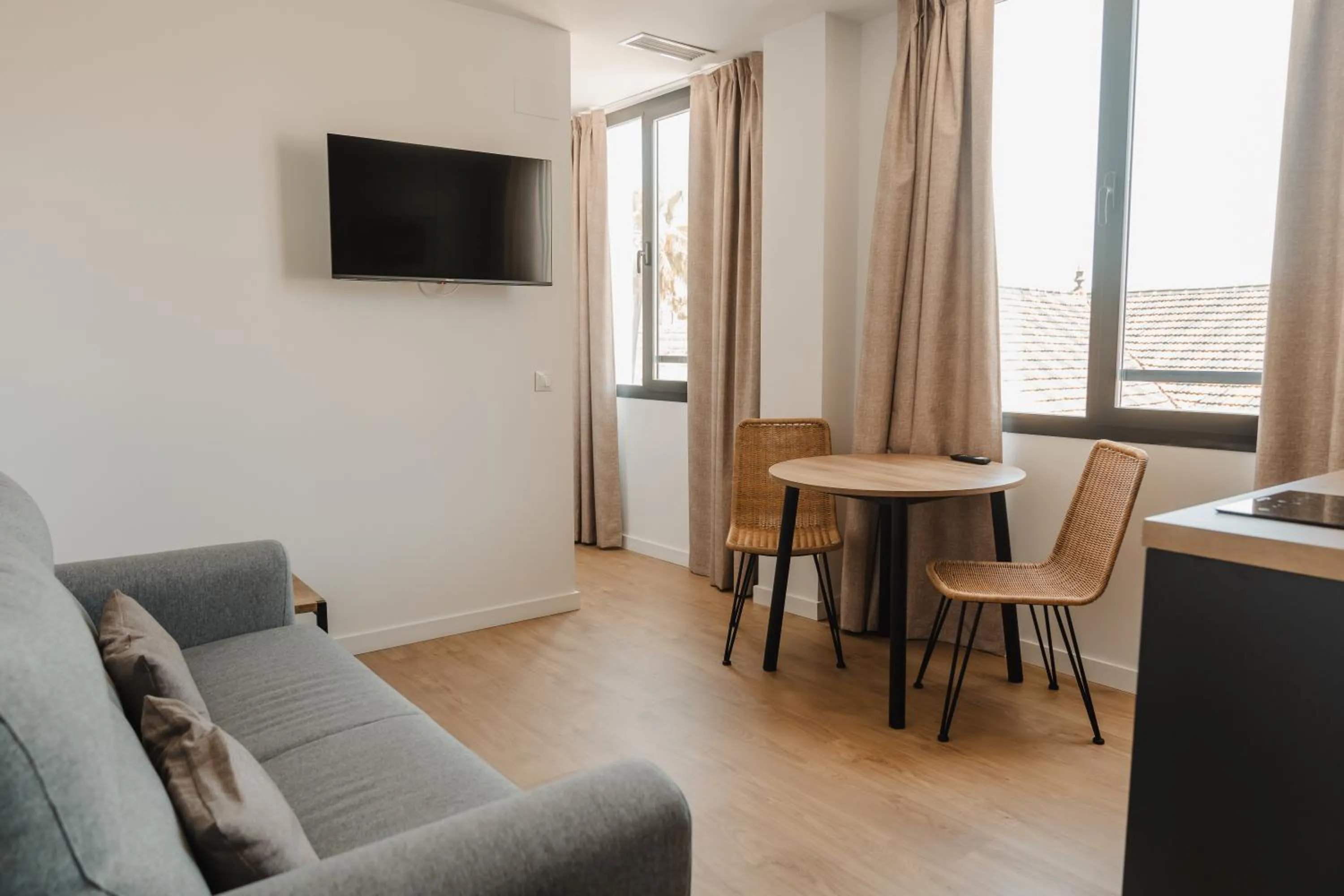 Communal lounge/ TV room in esZentrico Suites Jerez