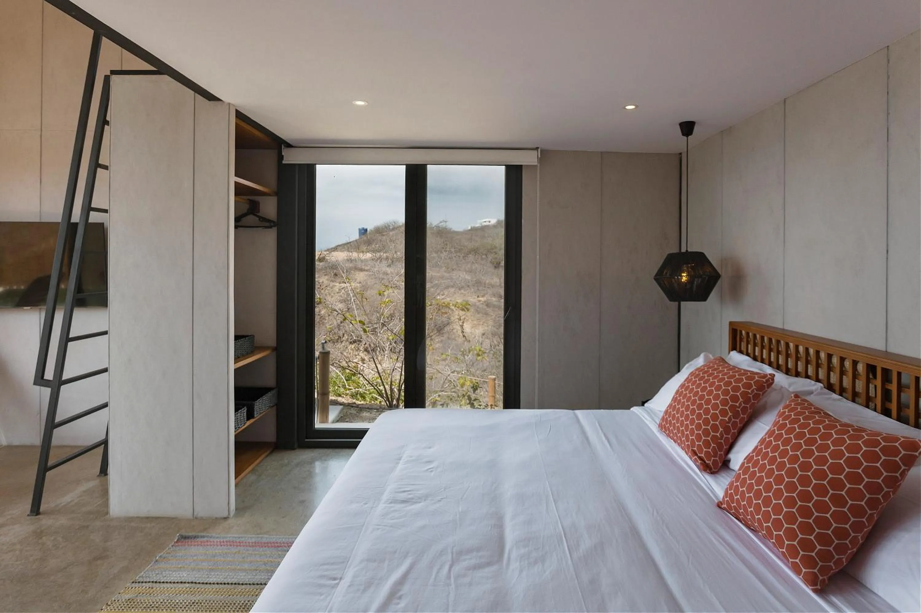 Bed in Eolia Sustainable Design Hotel