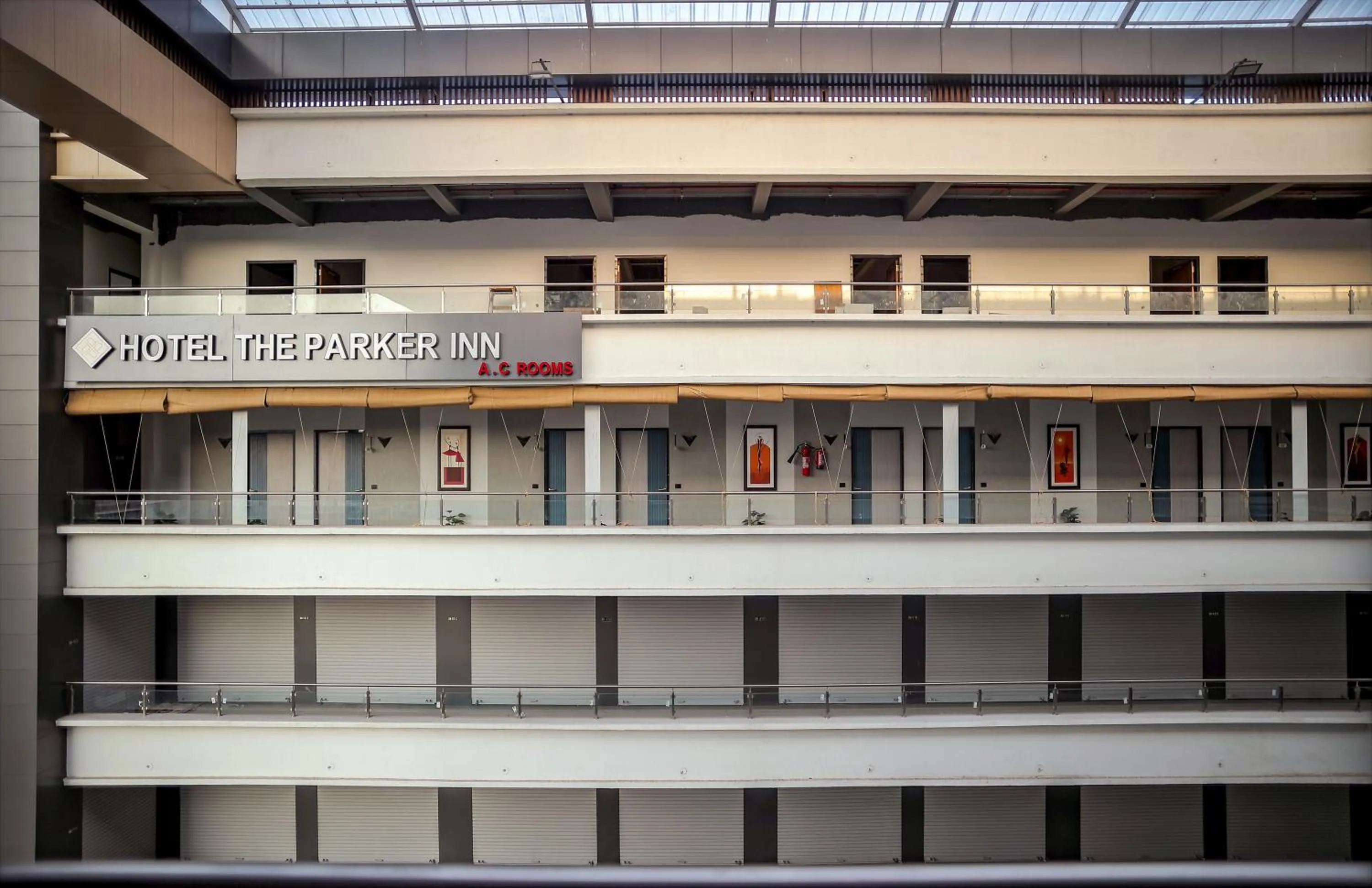 Property logo or sign in HOTEL THE PARKER INN By KBNT GROUP