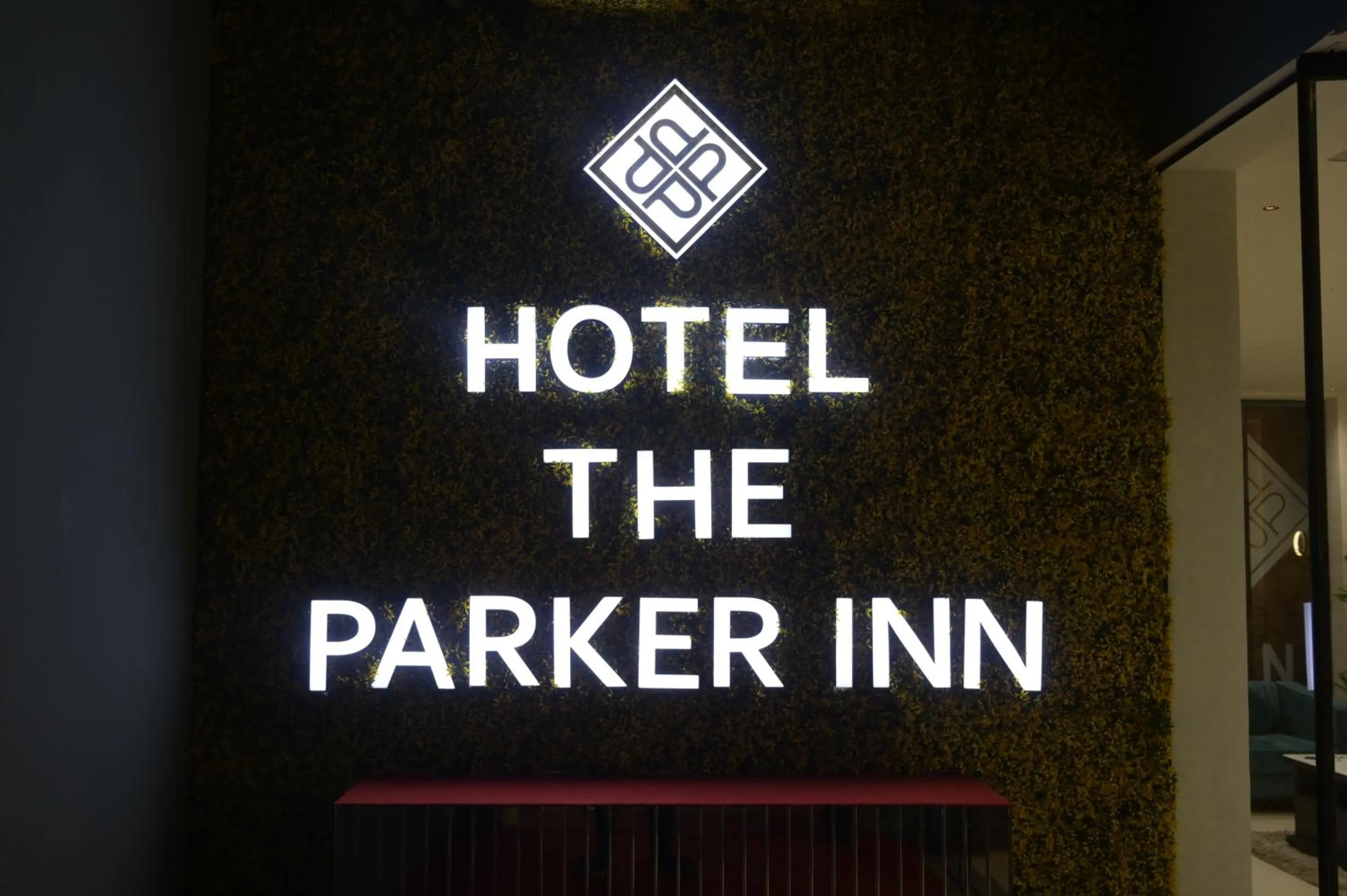 Property logo or sign in HOTEL THE PARKER INN By KBNT GROUP