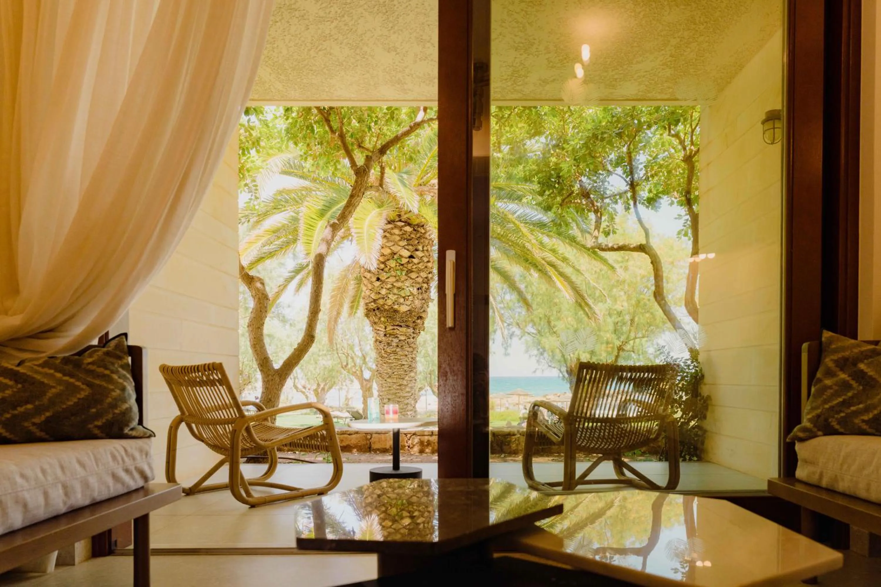 Seating area in Phāea Cretan Malia, a Member of Design Hotels