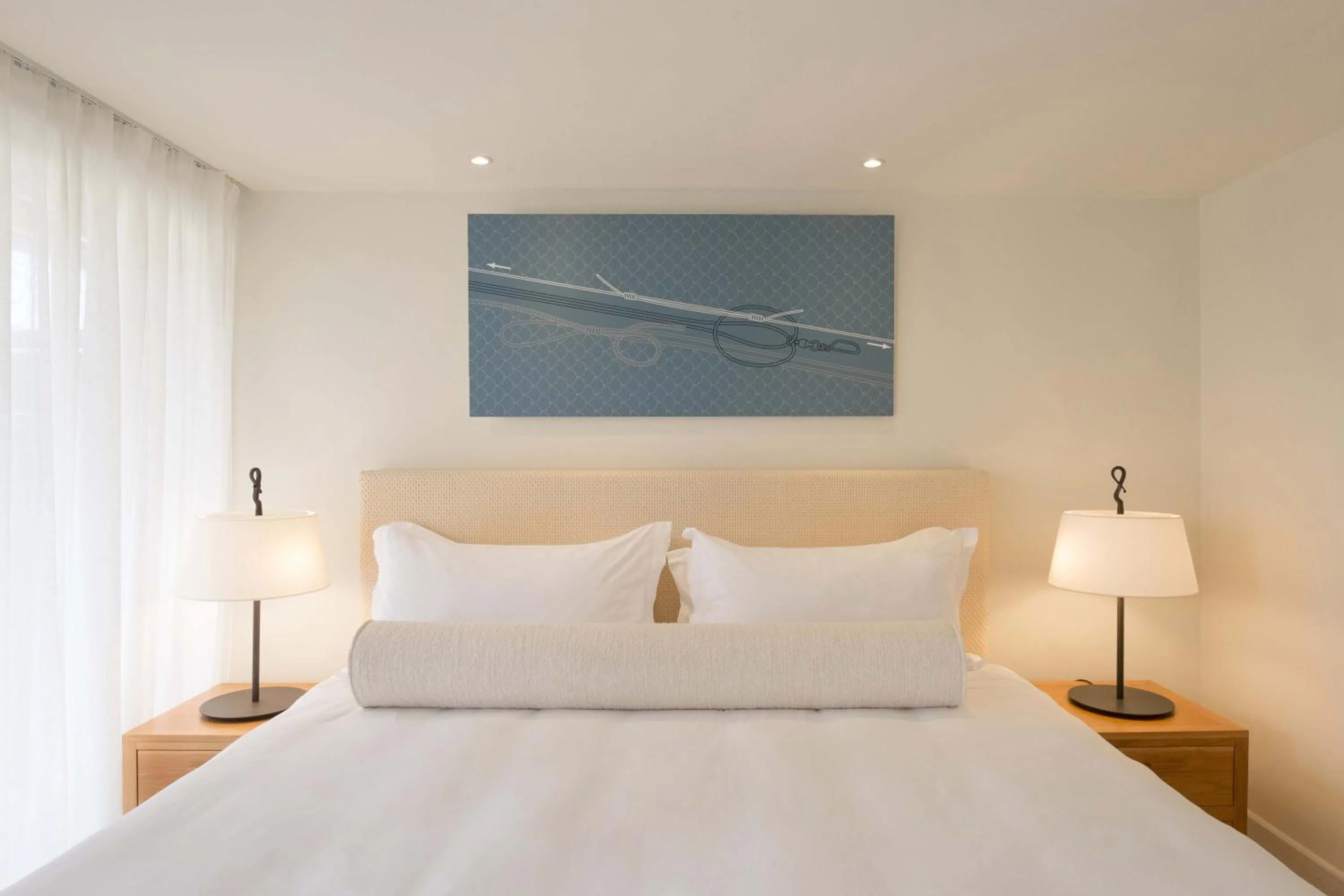 Bed in Phāea Blue - Small Luxury Hotels of the World