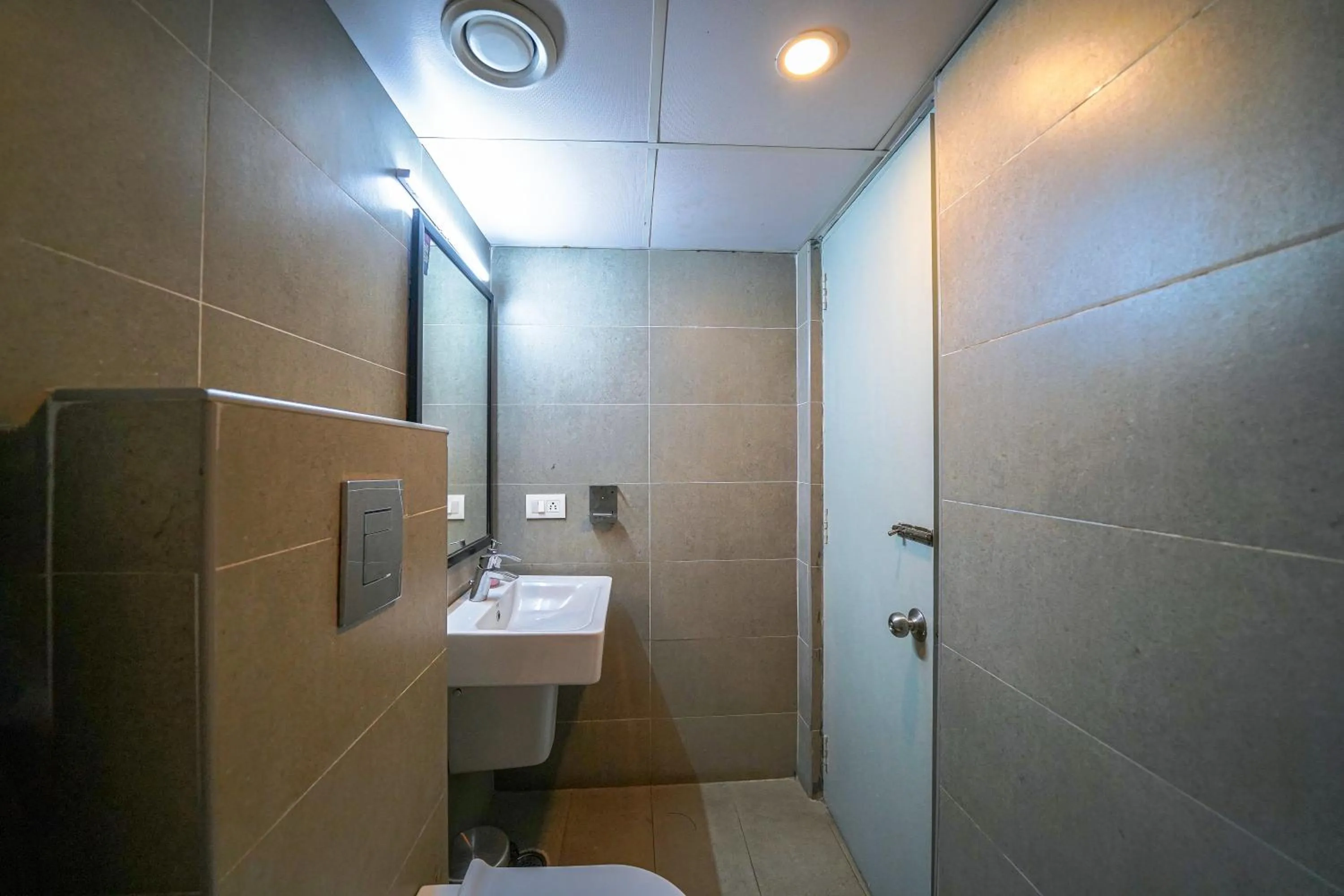 Bathroom in Olive Zip Richmond Circle by Embassy Group