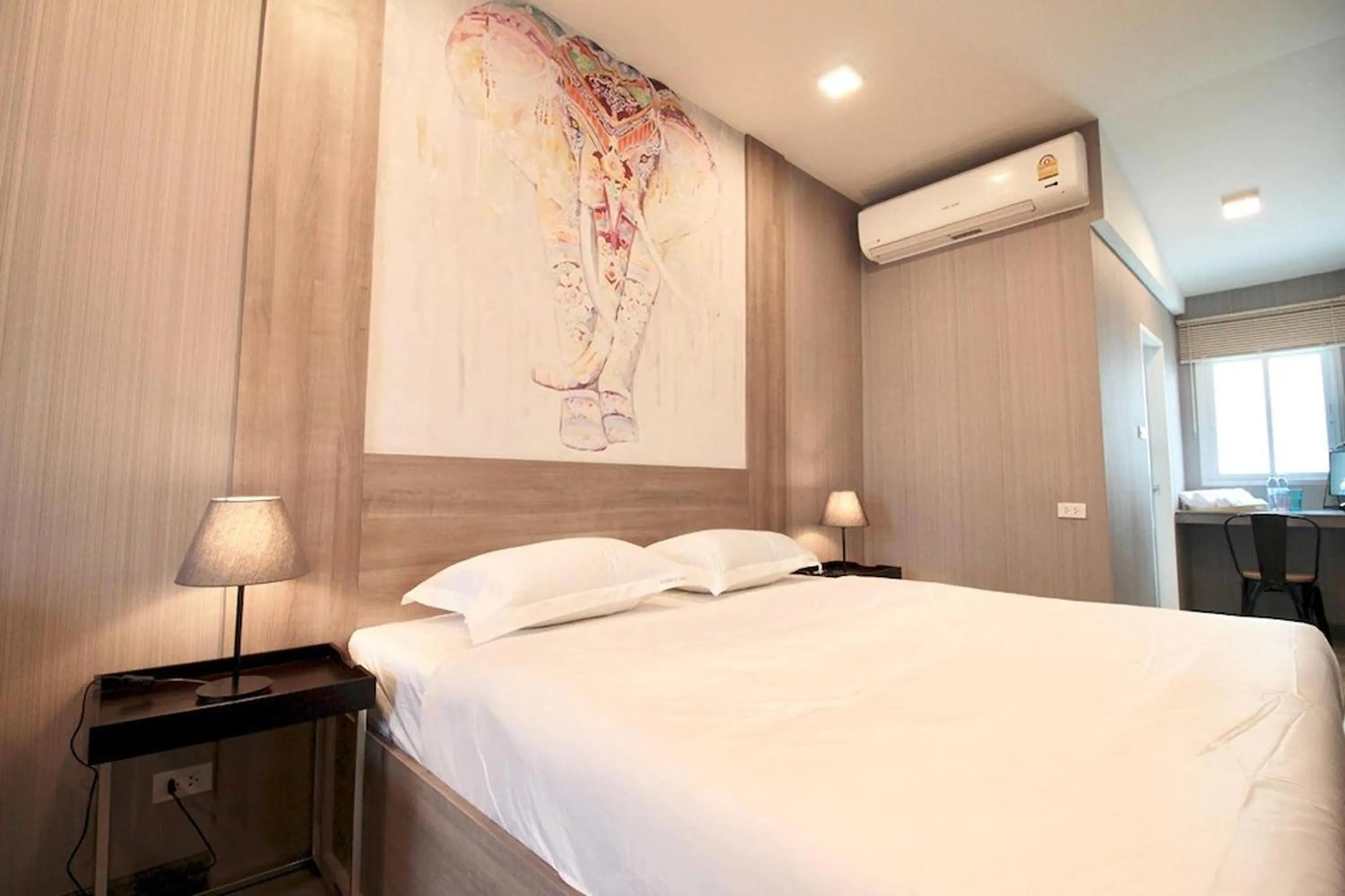 Bed in R 17 Living Hotel