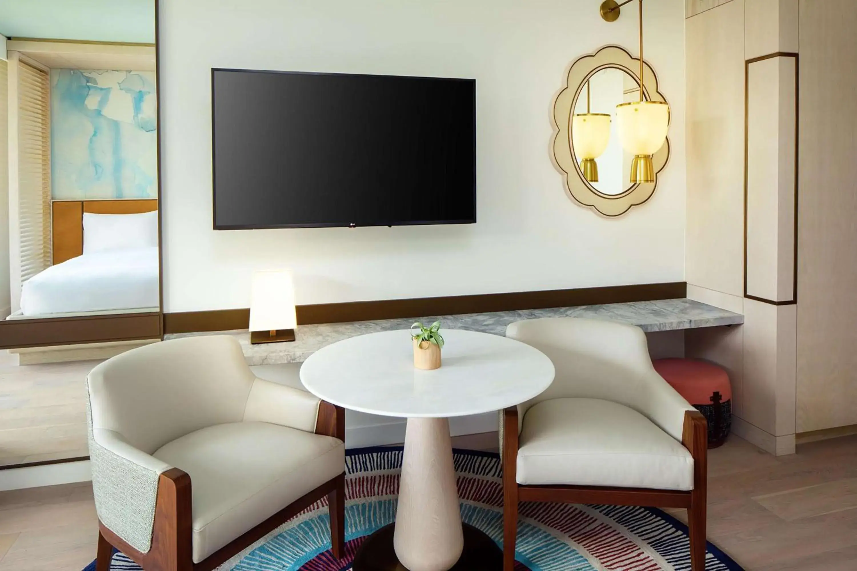 Queen Room with Two Queen Beds and Balcony - Lagoon View in Conrad Orlando Queen Room with Two Queen Beds and Balcony - Lagoon View in Conrad Orlando