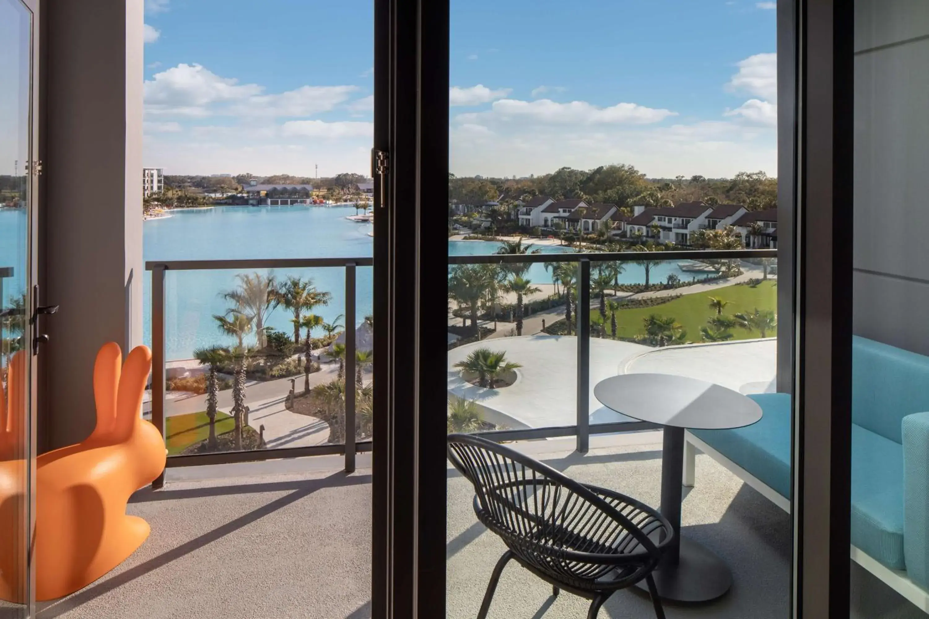 Queen Room with Two Queen Beds and Balcony - Lagoon View/Hearing Accessible in Conrad Orlando Queen Room with Two Queen Beds and Balcony - Lagoon View/Hearing Accessible in Conrad Orlando