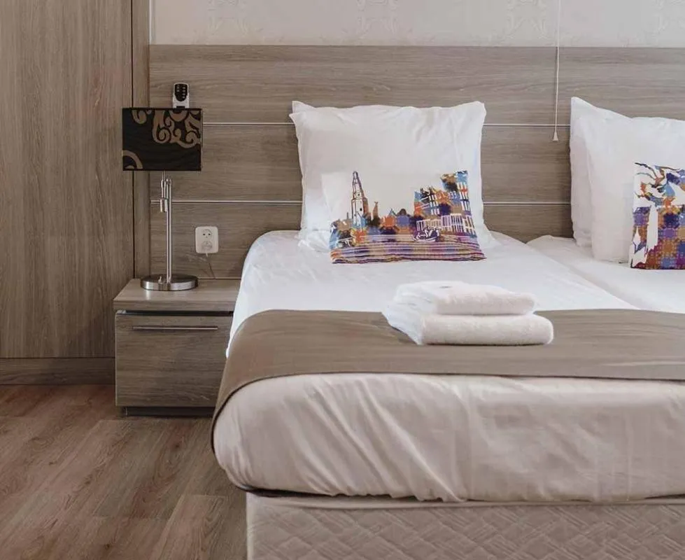 Bed in Stadsherberg de Wijnberg