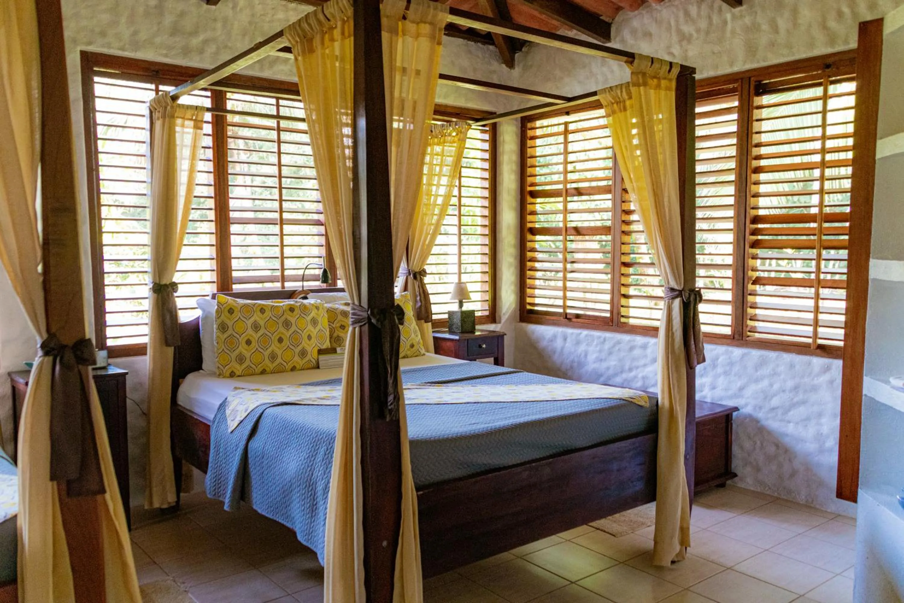 Bed in Corcovado Wilderness Lodge by SCP