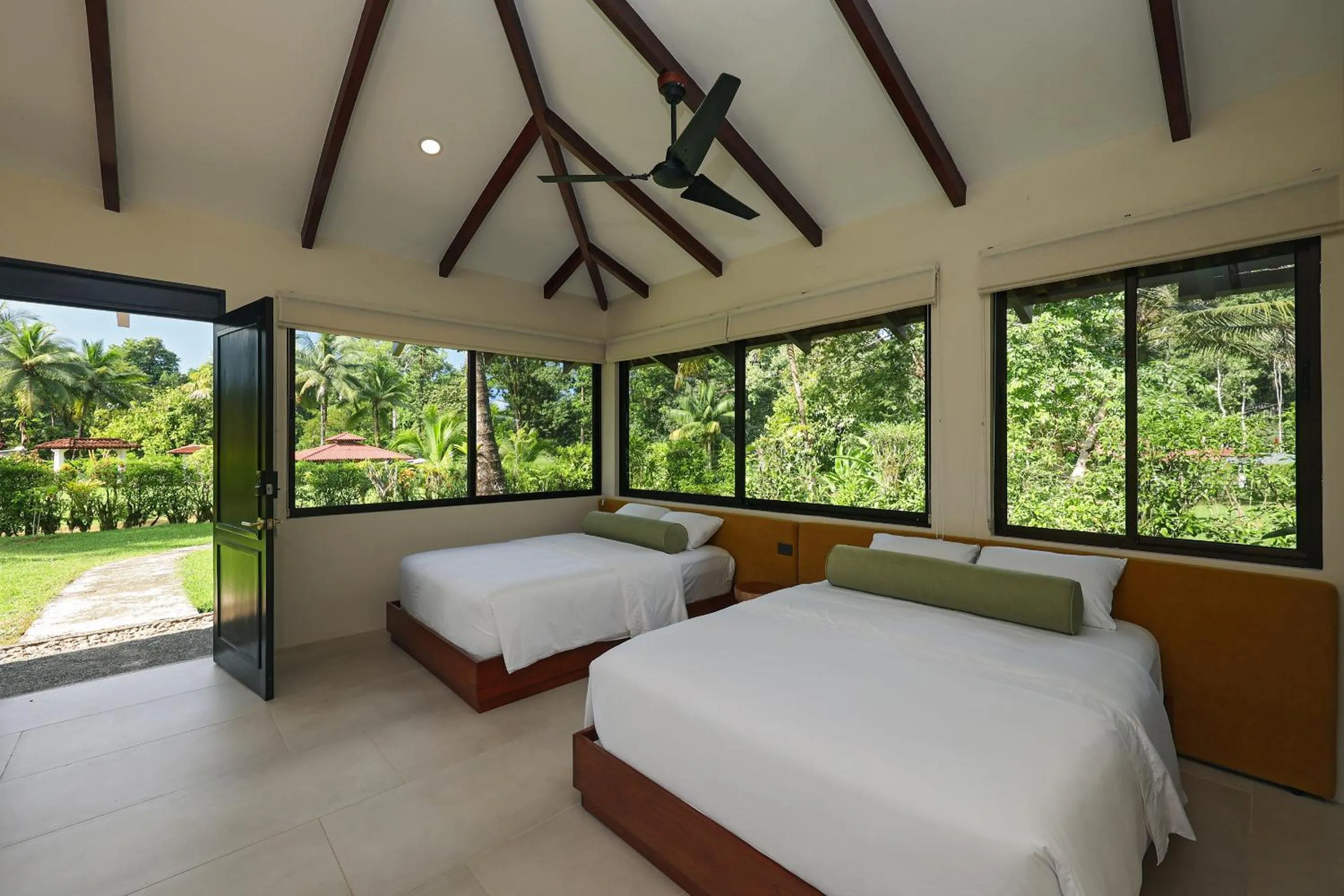 Bed in Corcovado Wilderness Lodge by SCP