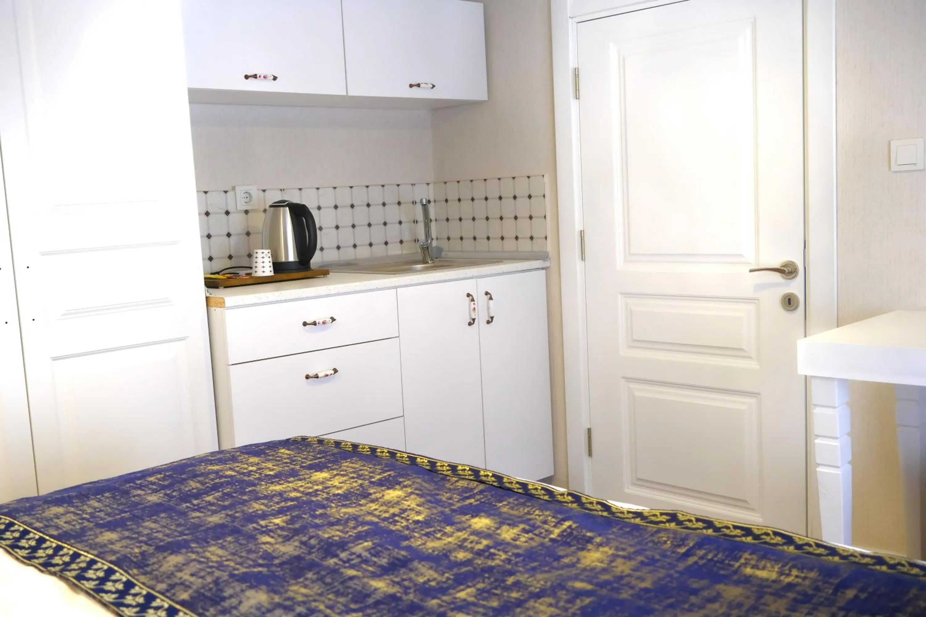 Kitchen or kitchenette, Bed in Olympos Garden Hotel