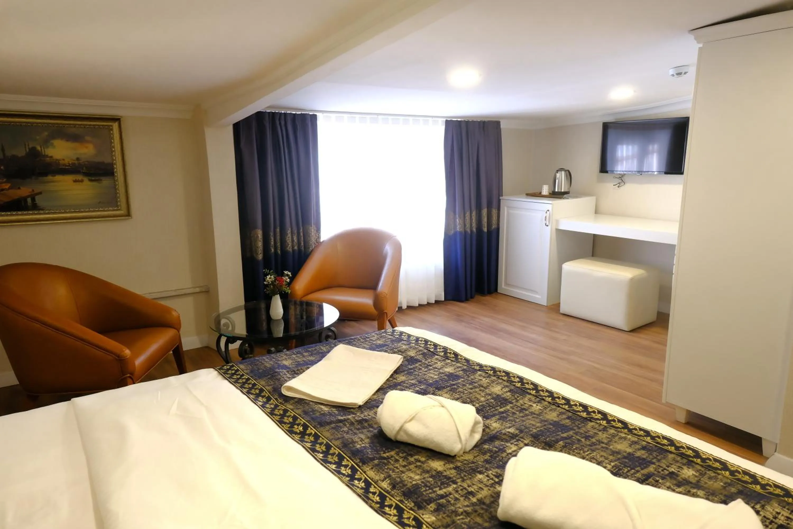 Seating area, Bed in Olympos Garden Hotel