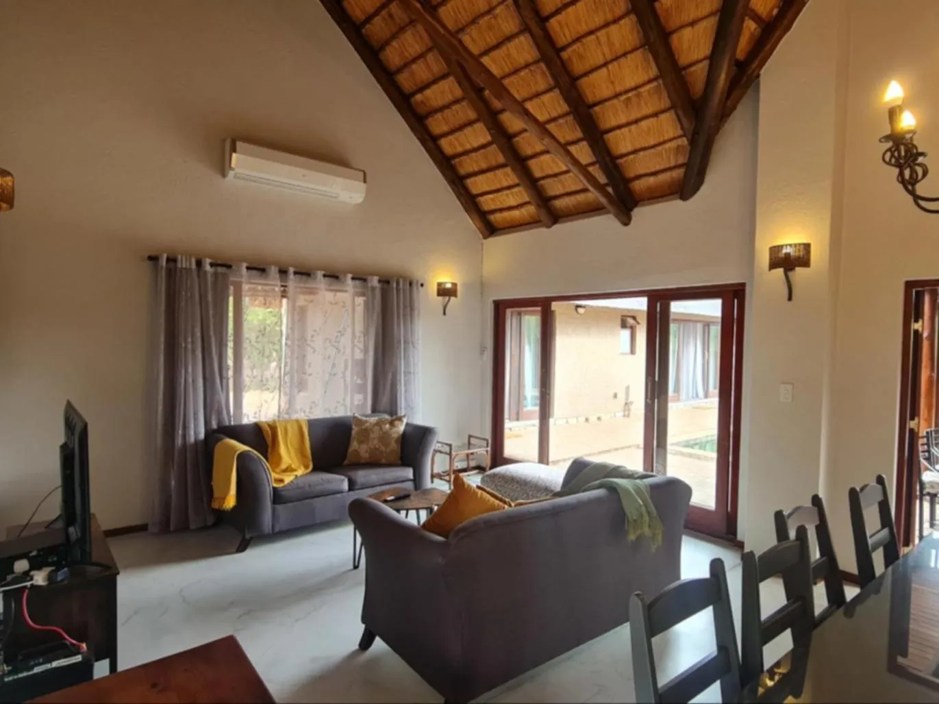 Communal lounge/ TV room in Hoedspruit Bush Stay