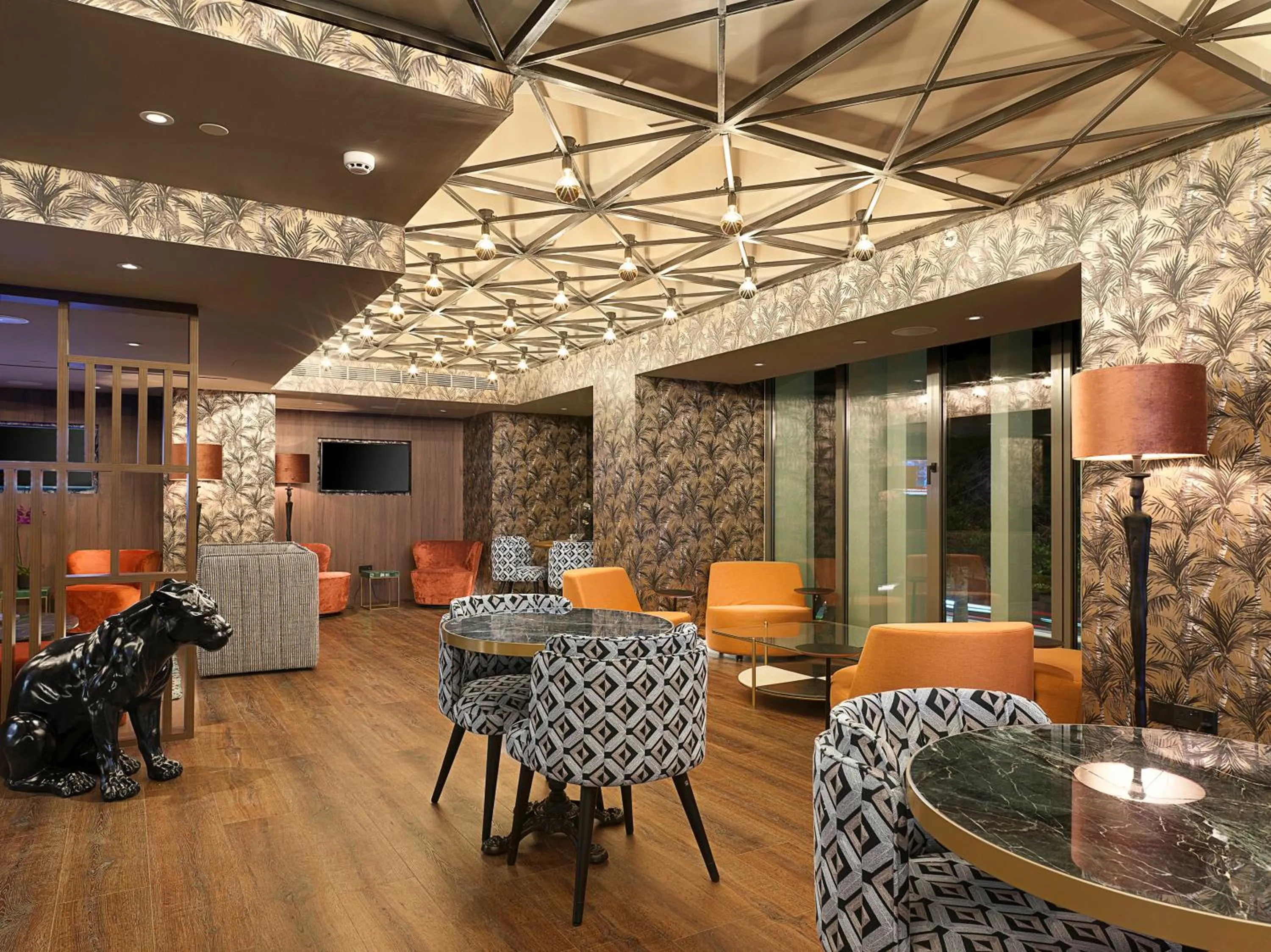 Lounge or bar in NYX Hotel Limassol