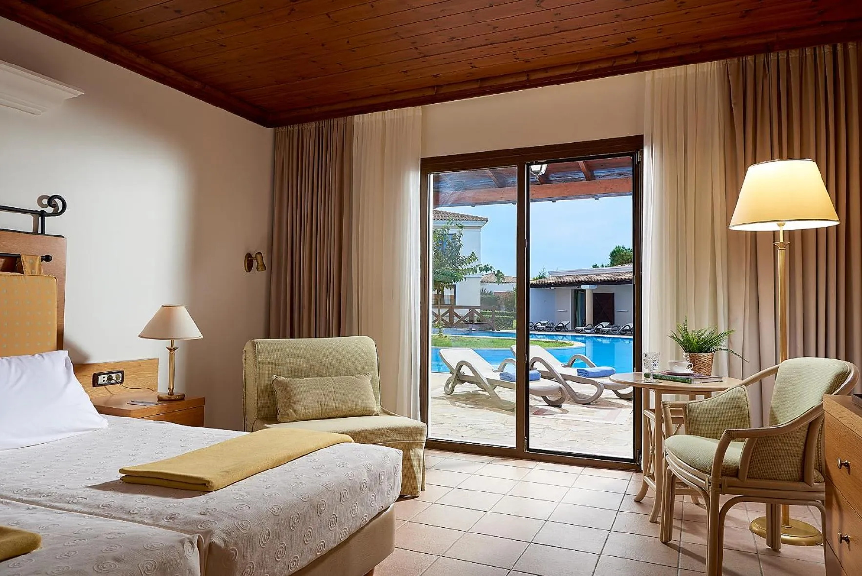 Seating area, Bed in Aldemar Olympian Village