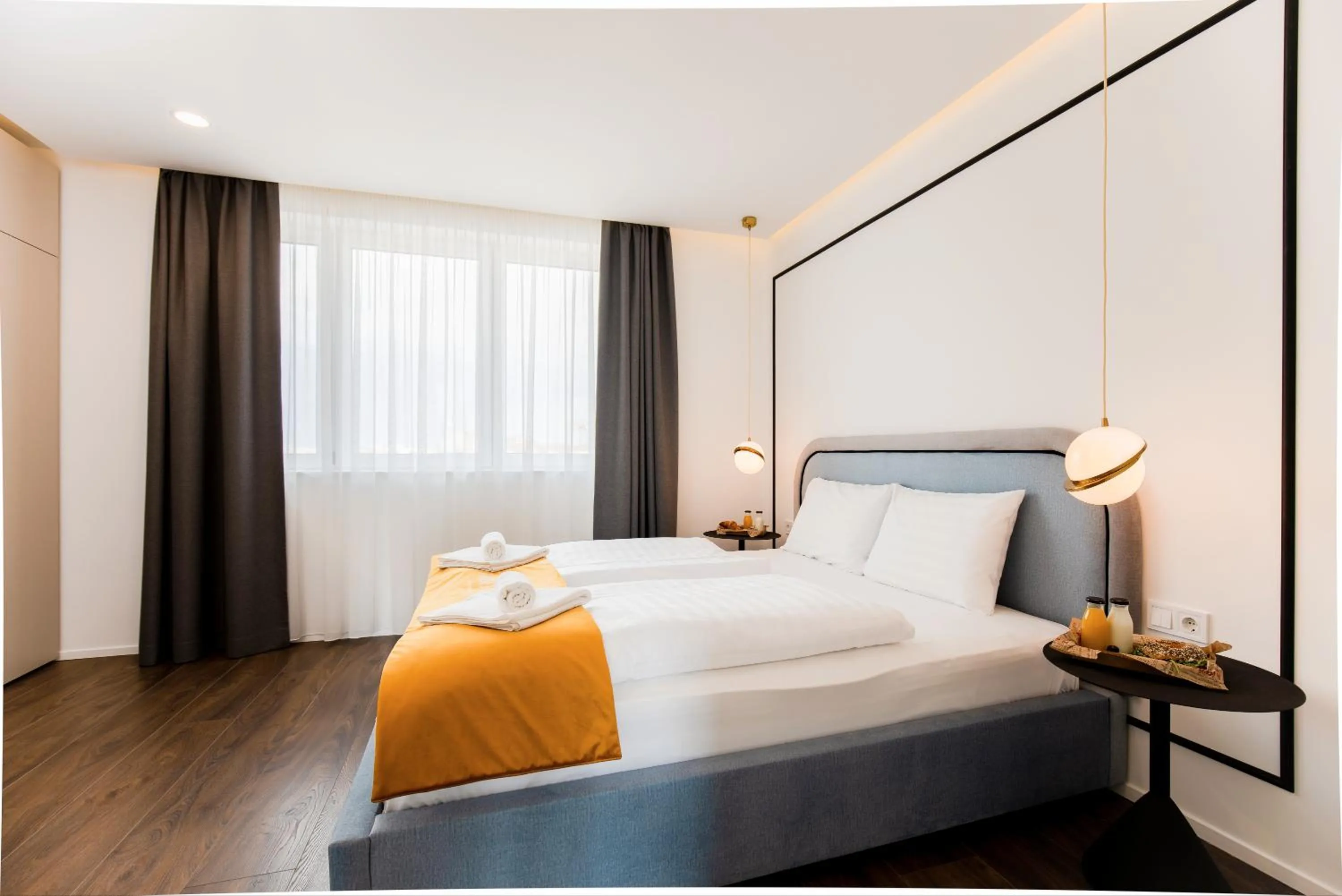 Bedroom, Bed in The Amberlyn Suite Hotel