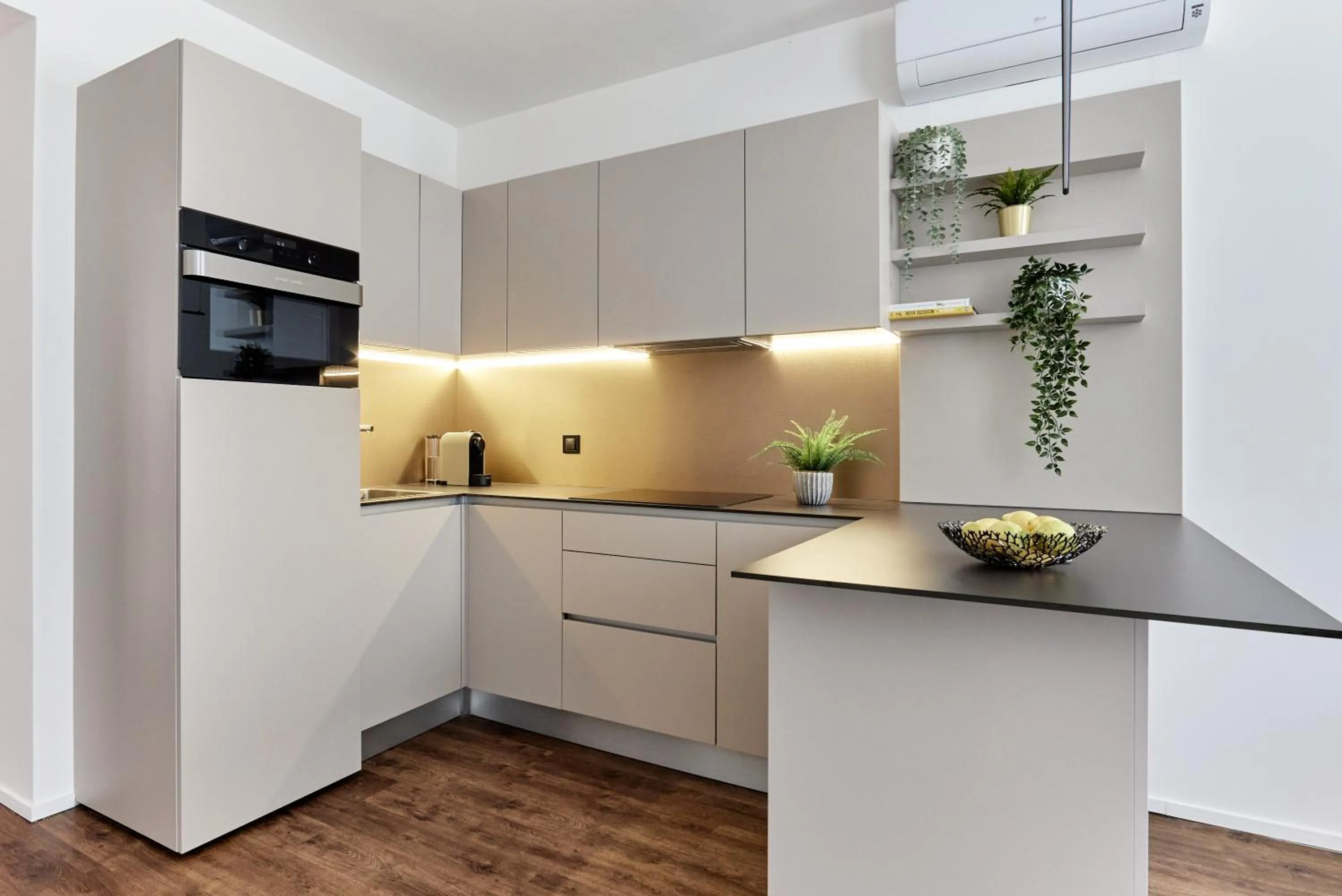 Kitchen or kitchenette in The Amberlyn Suite Hotel